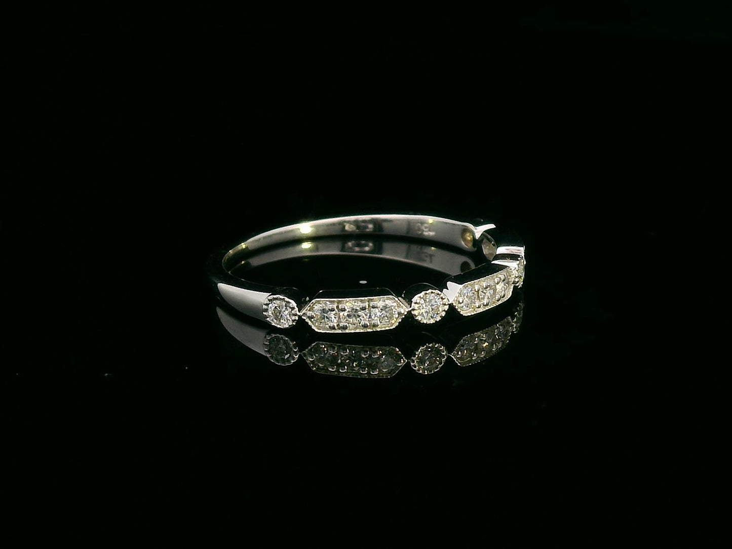 18K white gold band with alternating marquise and round shapes pavé-set with diamonds