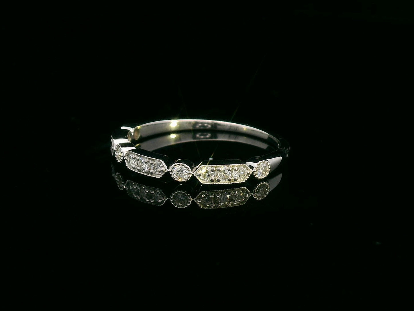 18K white gold band with alternating marquise and round shapes pavé-set with diamonds