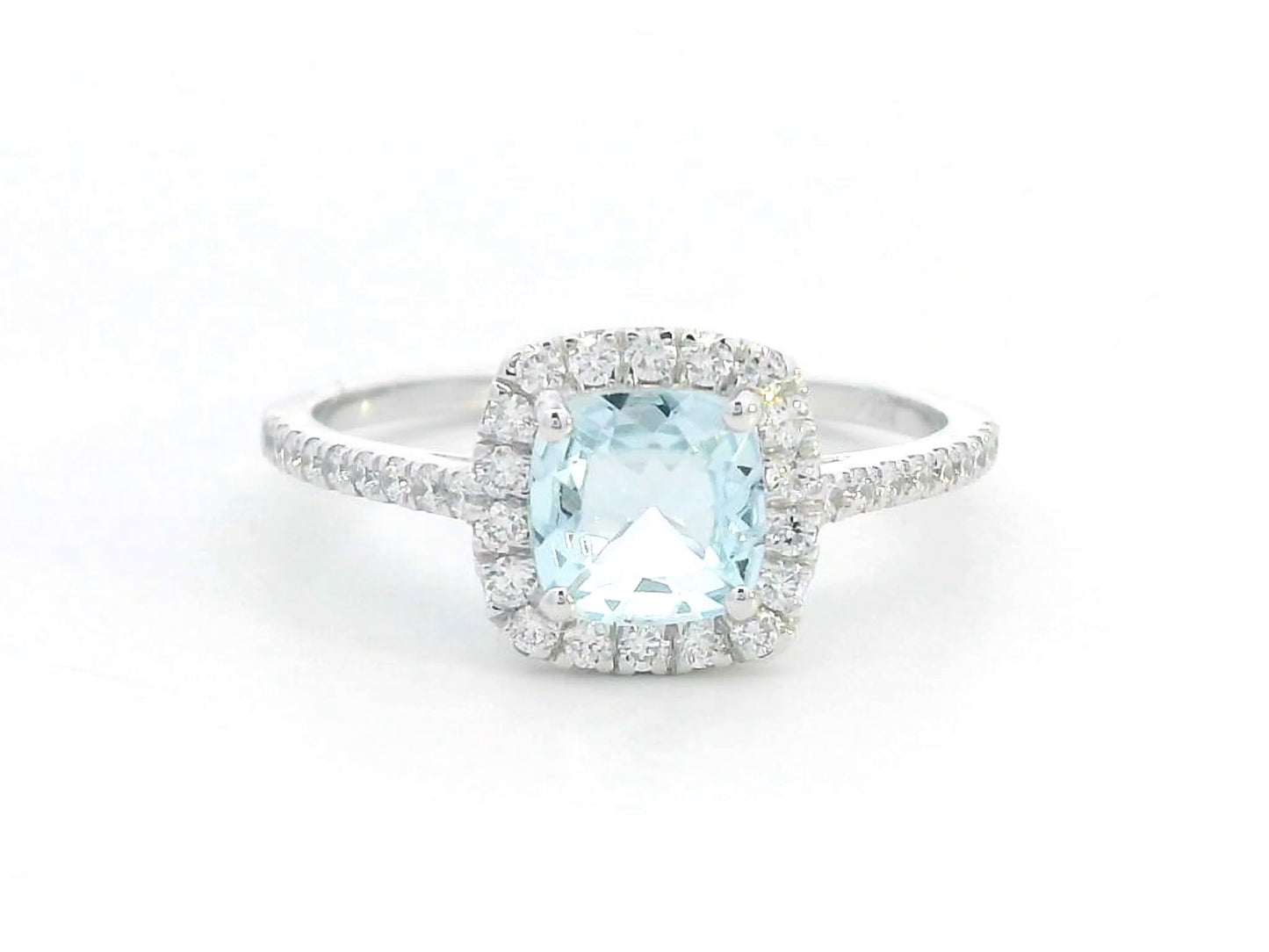 18K white gold ring with cushion-cut aquamarine center and diamond halo and band