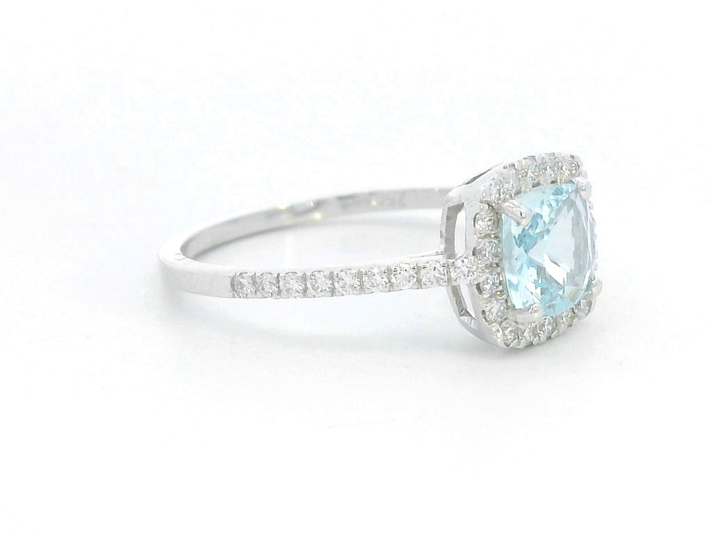 18K white gold ring with cushion-cut aquamarine center and diamond halo and band