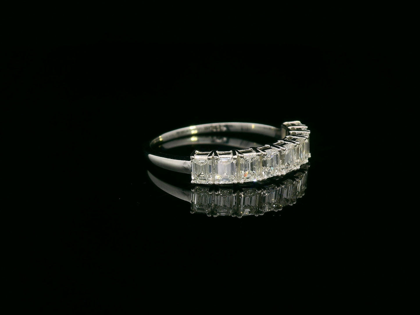 Emerald-cut diamond band in 18K white gold, 1.25 carats total, half eternity design