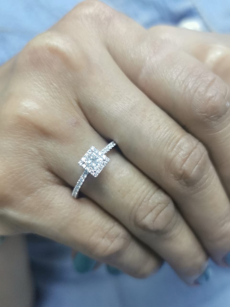 18K White Gold Princess Cut Diamond Halo Ring with 0.31ct center and 0.29ct accent diamonds