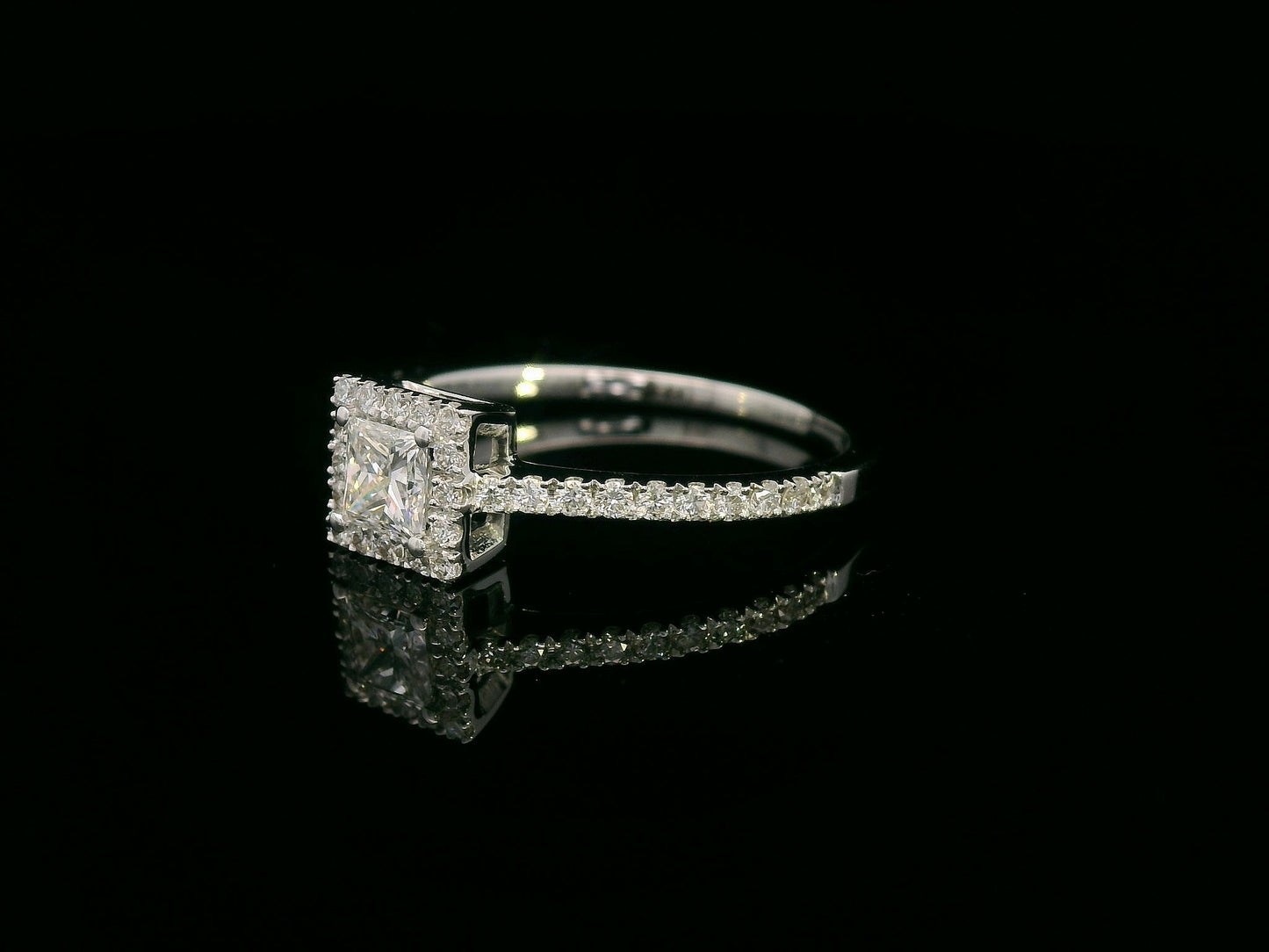 18K White Gold Princess Cut Diamond Halo Ring with 0.31ct center and 0.29ct accent diamonds
