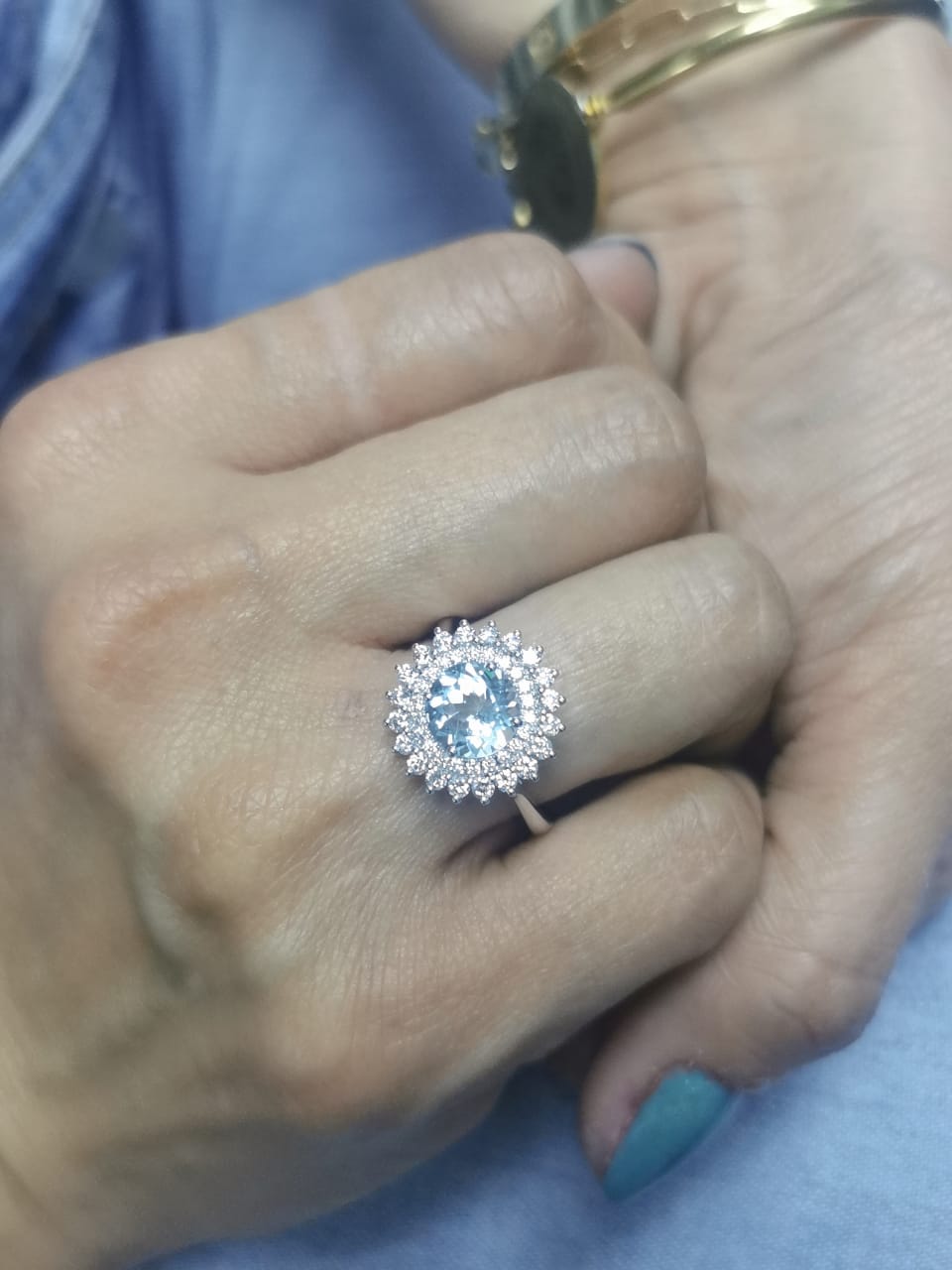 18K white gold ring with 1.52 carat round aquamarine and double diamond halo in floral vintage design
