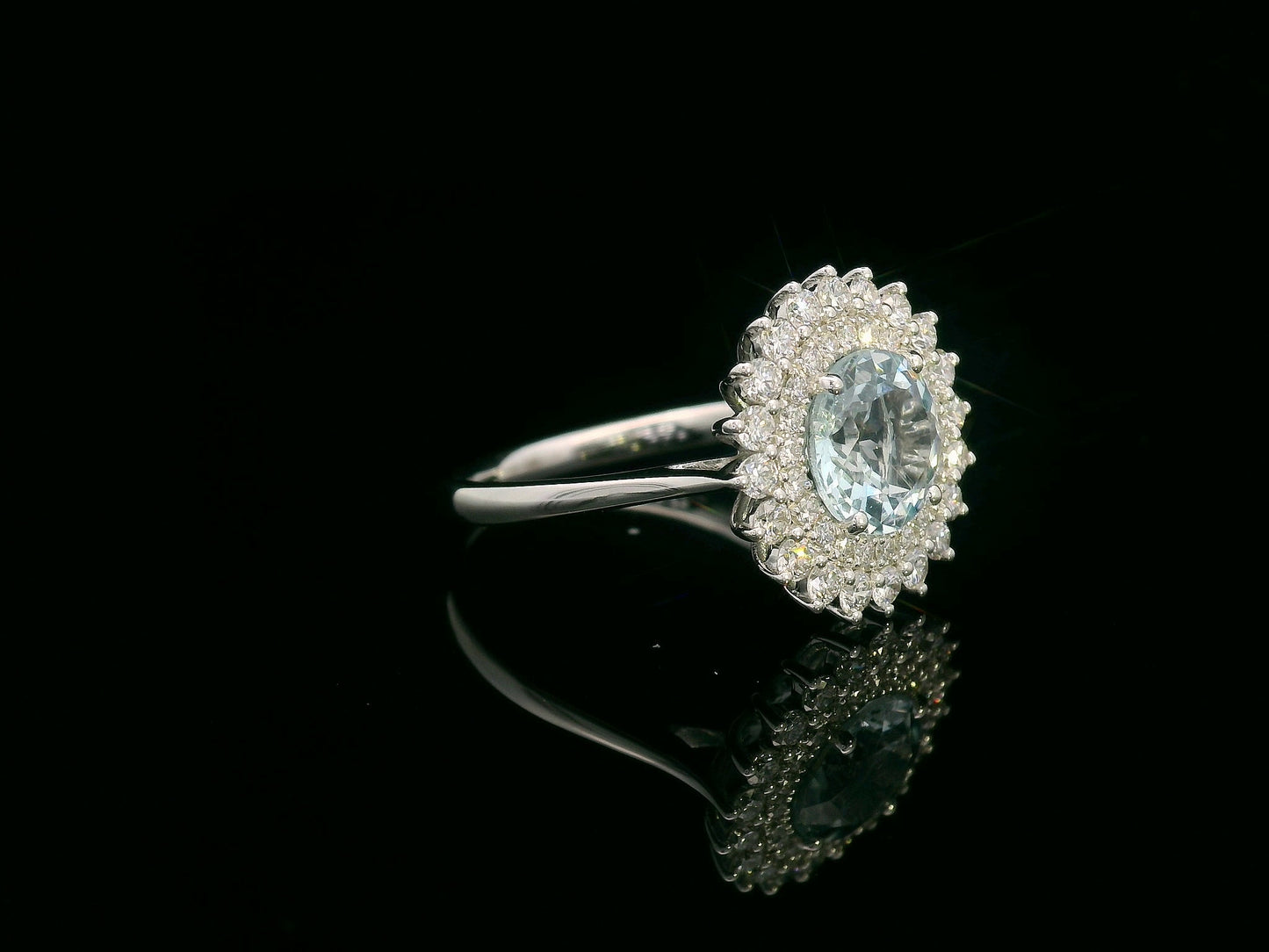 18K white gold ring with 1.52 carat round aquamarine and double diamond halo in floral vintage design