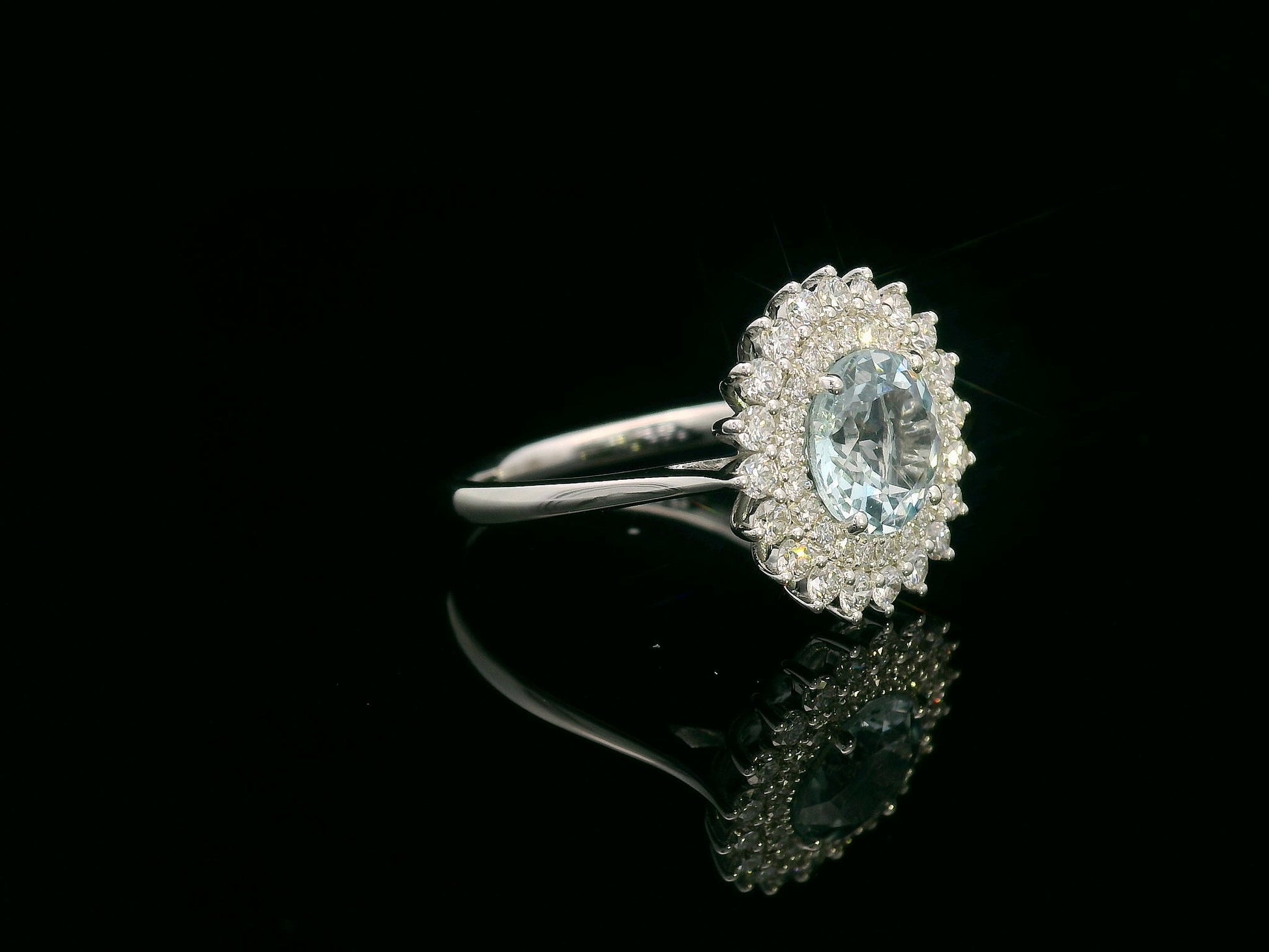 18K white gold ring with 1.52 carat round aquamarine and double diamond halo in floral vintage design