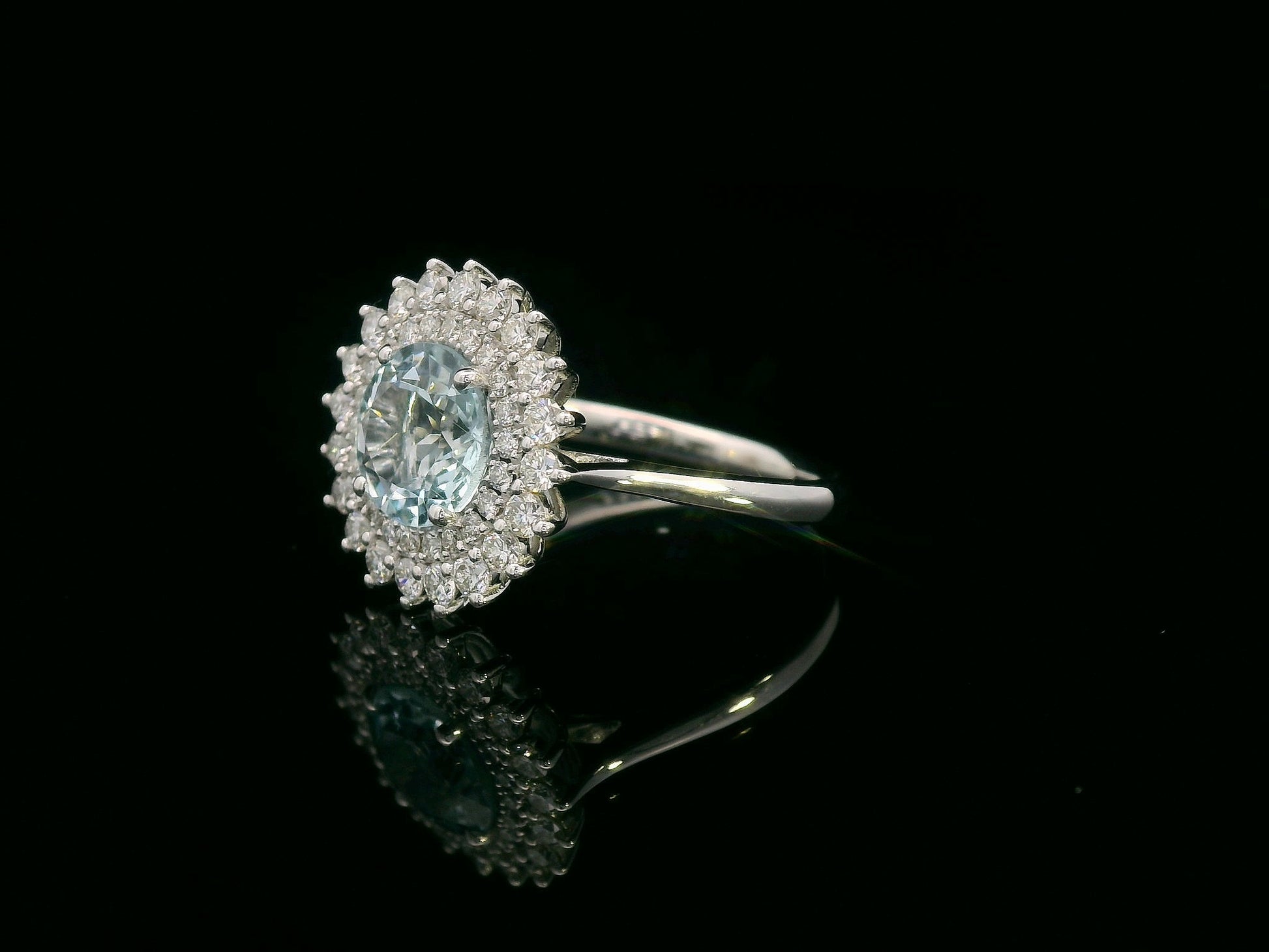 18K white gold ring with 1.52 carat round aquamarine and double diamond halo in floral vintage design