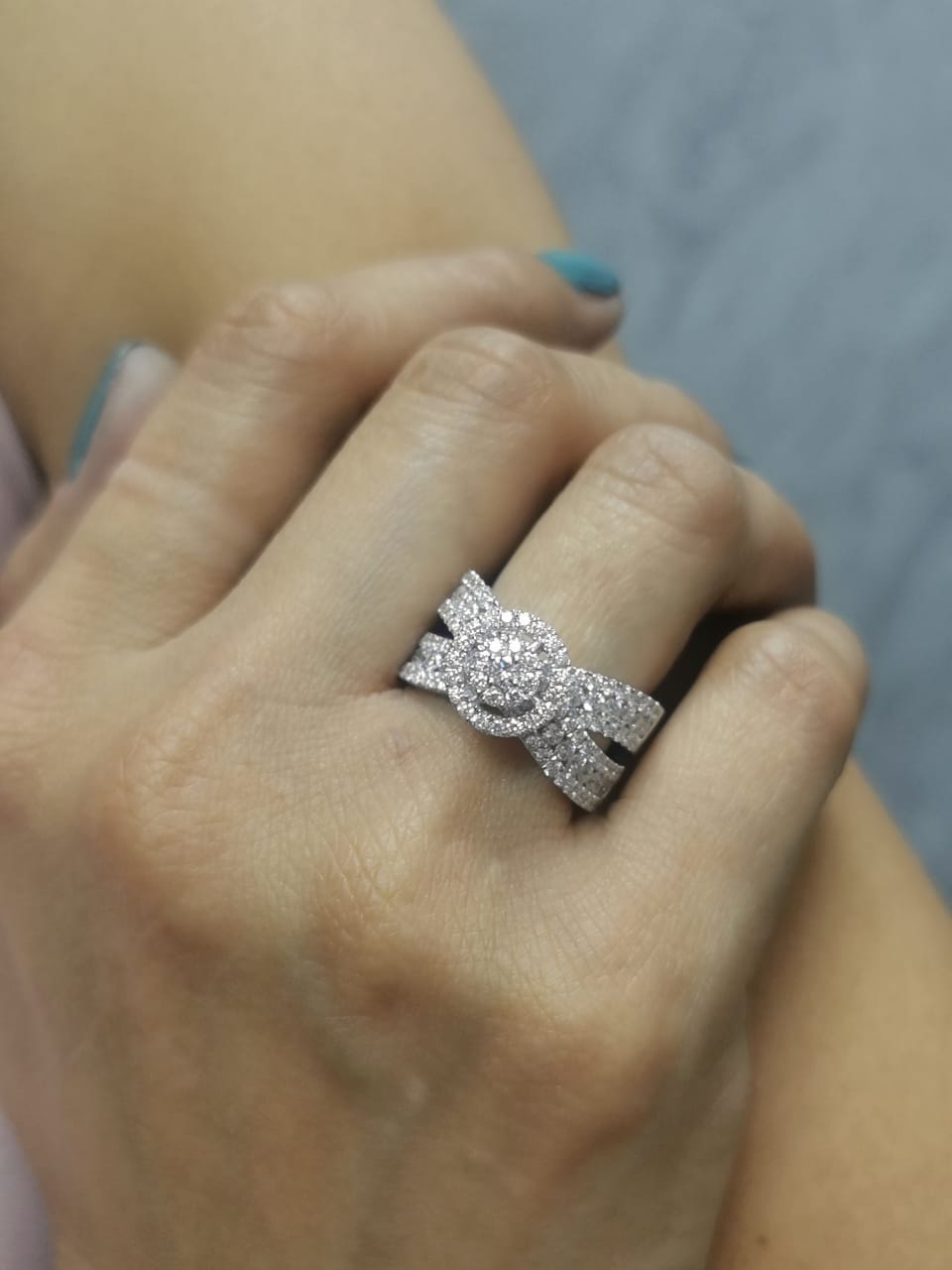 18K gold crossover diamond ring with 2.29 carat round-cut diamonds and double halo design