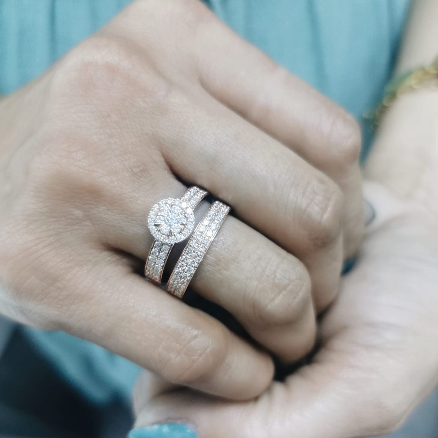 18K rose gold bridal set with floral diamond cluster engagement ring and pavé-set wedding band – 1.03 carats