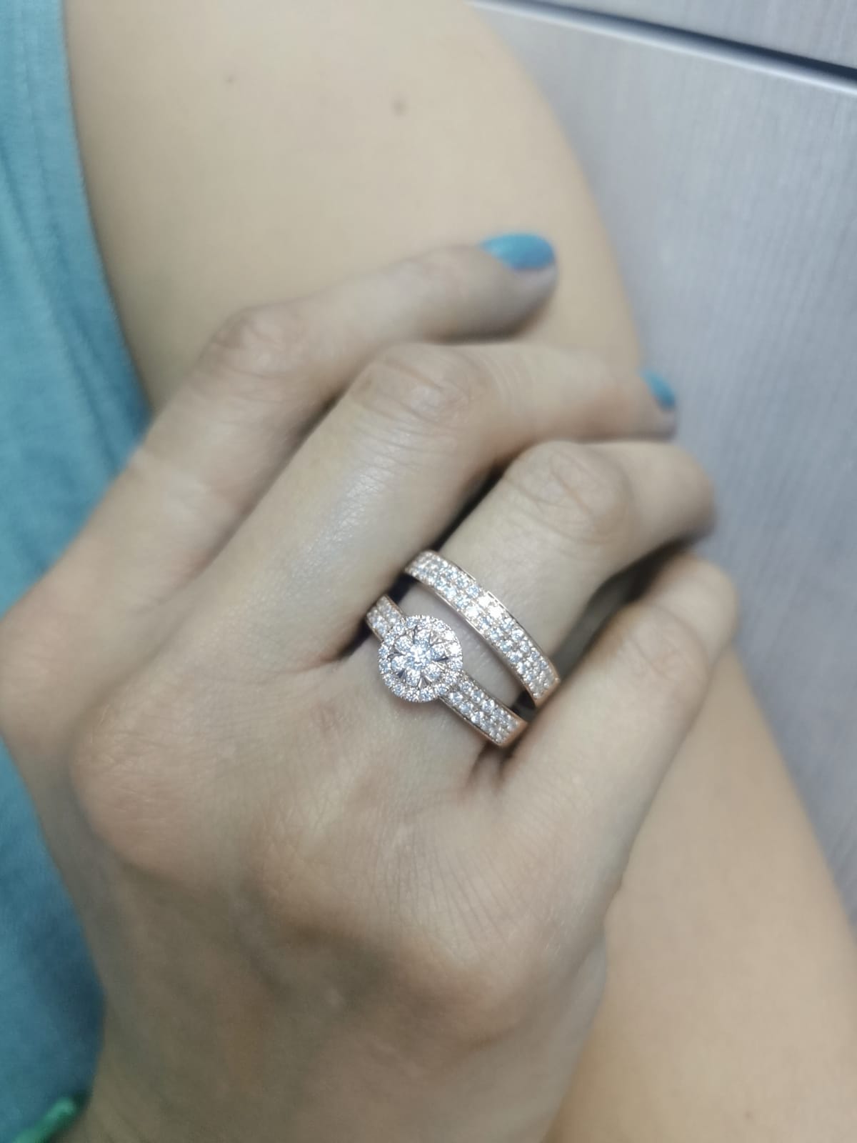 18K rose gold bridal set with floral diamond cluster engagement ring and pavé-set wedding band – 1.03 carats