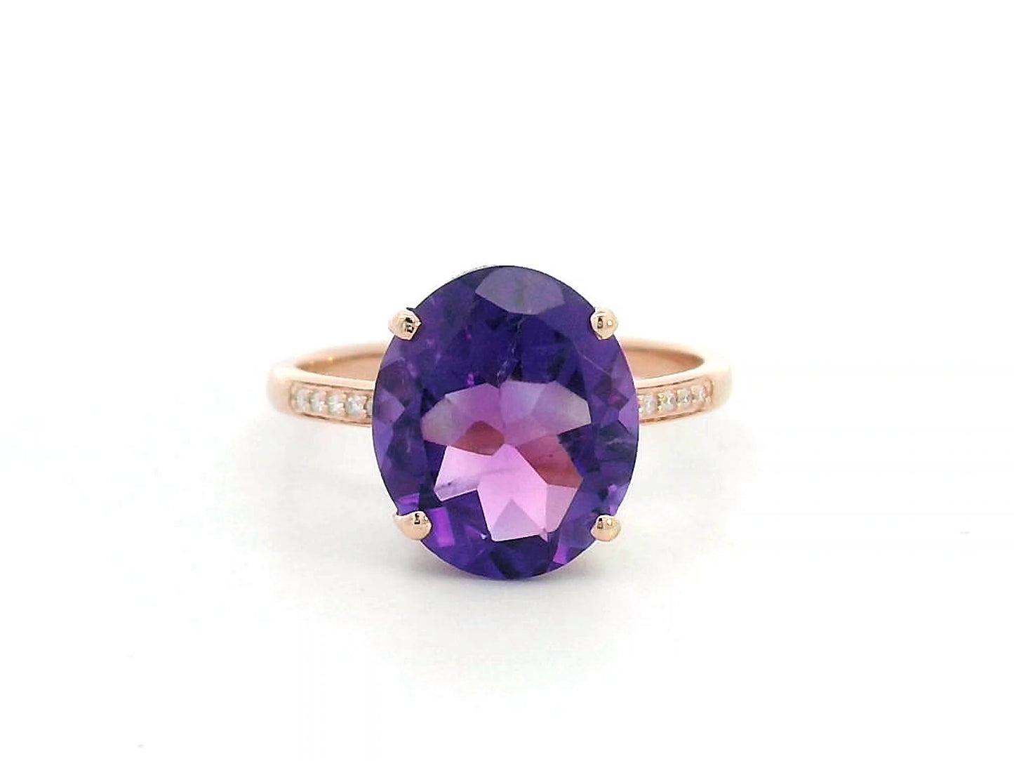 18K rose gold ring with oval 3.76 carat Amethyst and diamond-accented shoulders