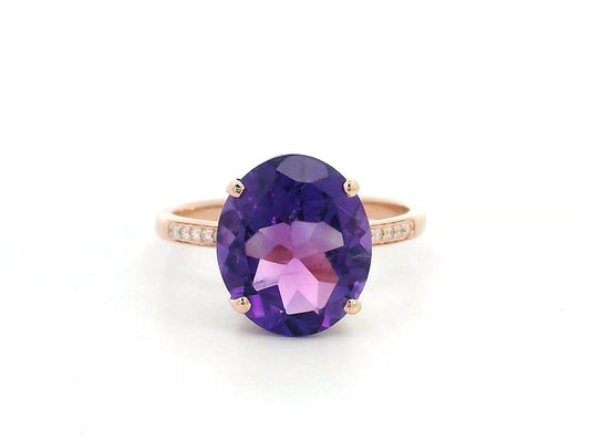 18K rose gold ring with oval 3.76 carat Amethyst and diamond-accented shoulders