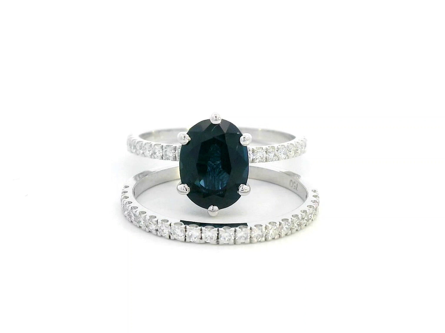 18K gold sapphire bridal set with 3.21 carat oval-cut center and pavé diamonds totaling 0.59 carats