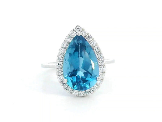 18K white gold ring with 5.26 carat pear-cut London Blue Topaz and diamond halo