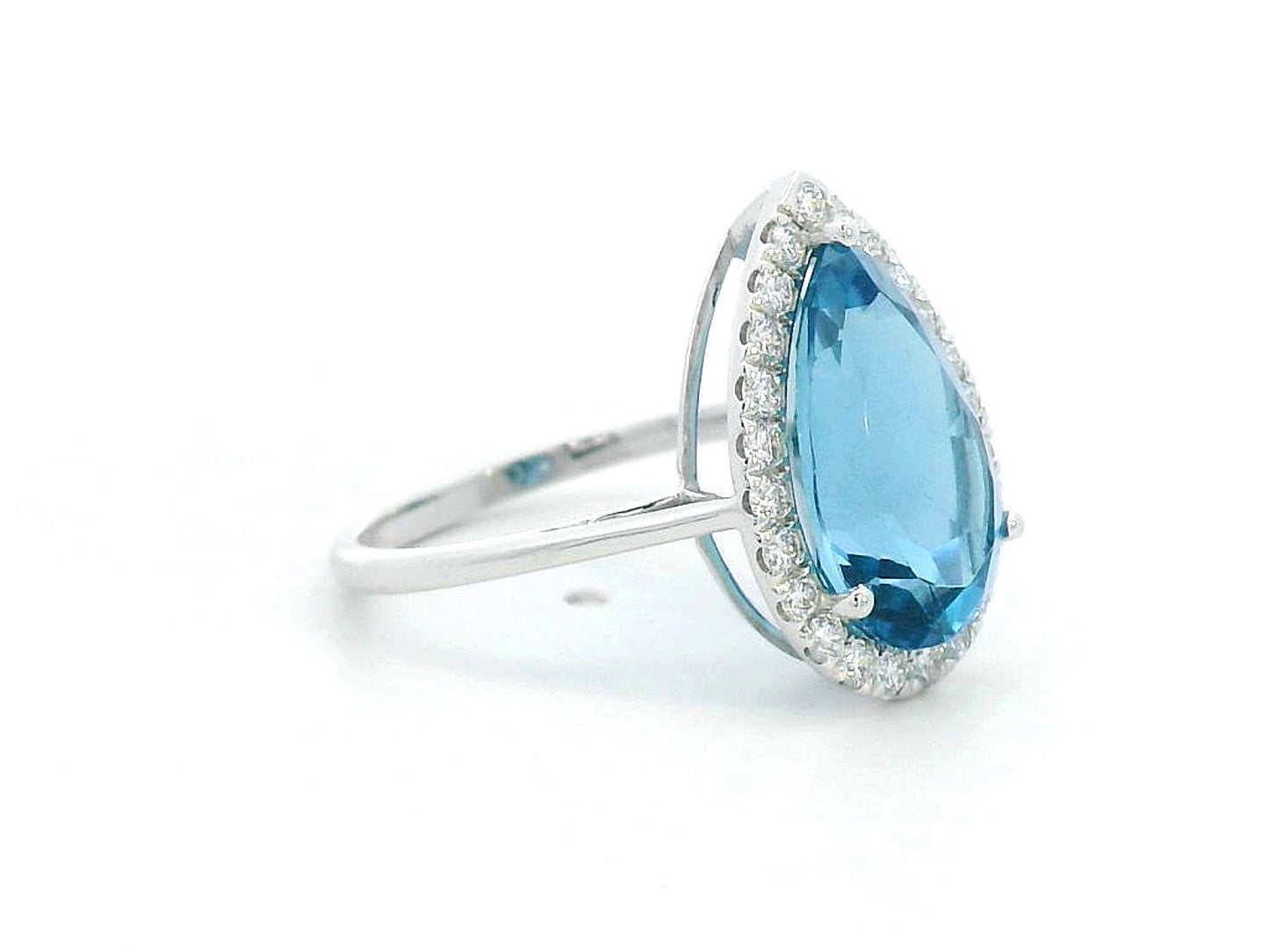 18K white gold ring with 5.26 carat pear-cut London Blue Topaz and diamond halo