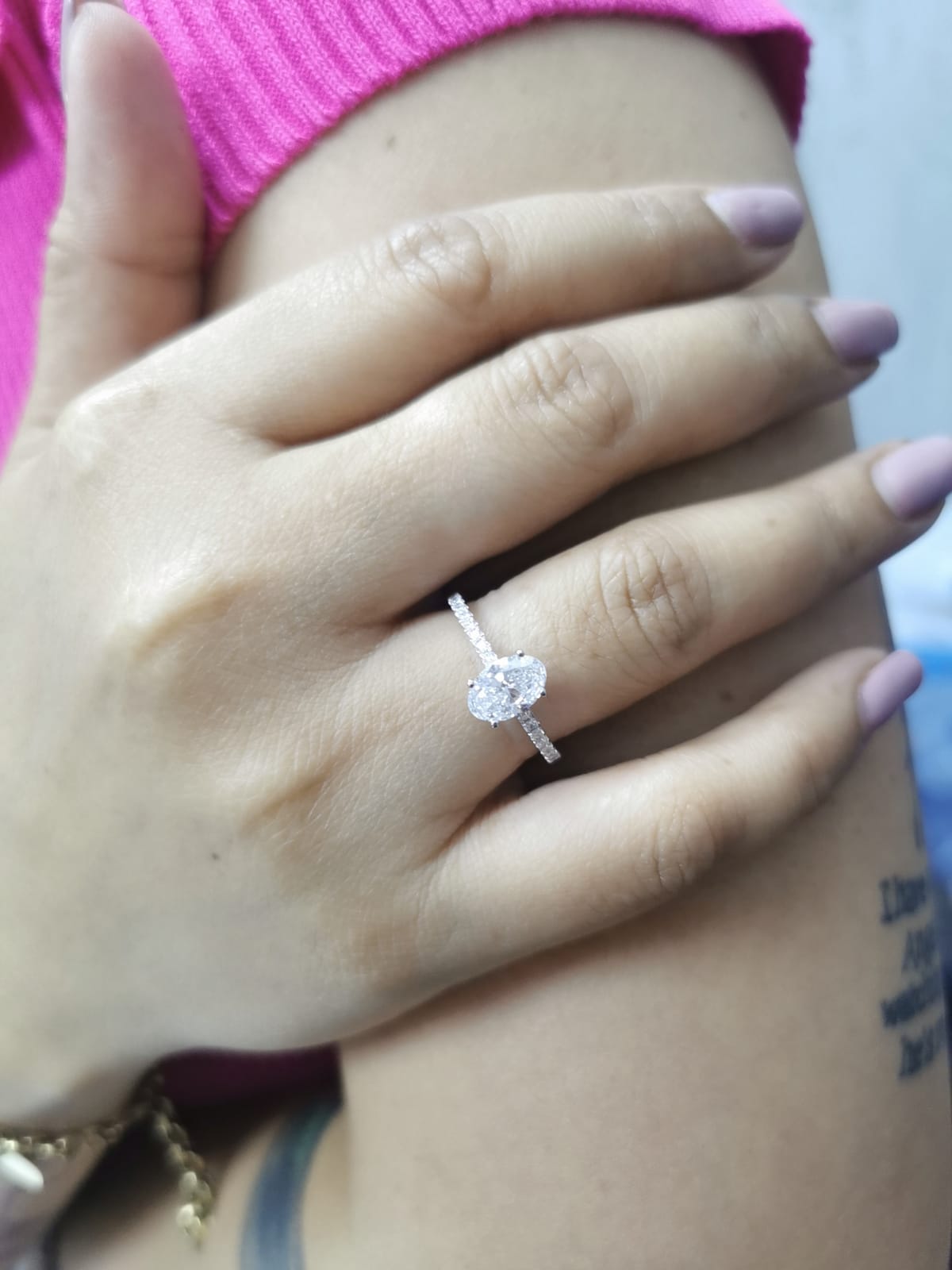 18K white gold oval diamond engagement ring with round diamonds along band – 1.01 carat D color center stone, IGI certified