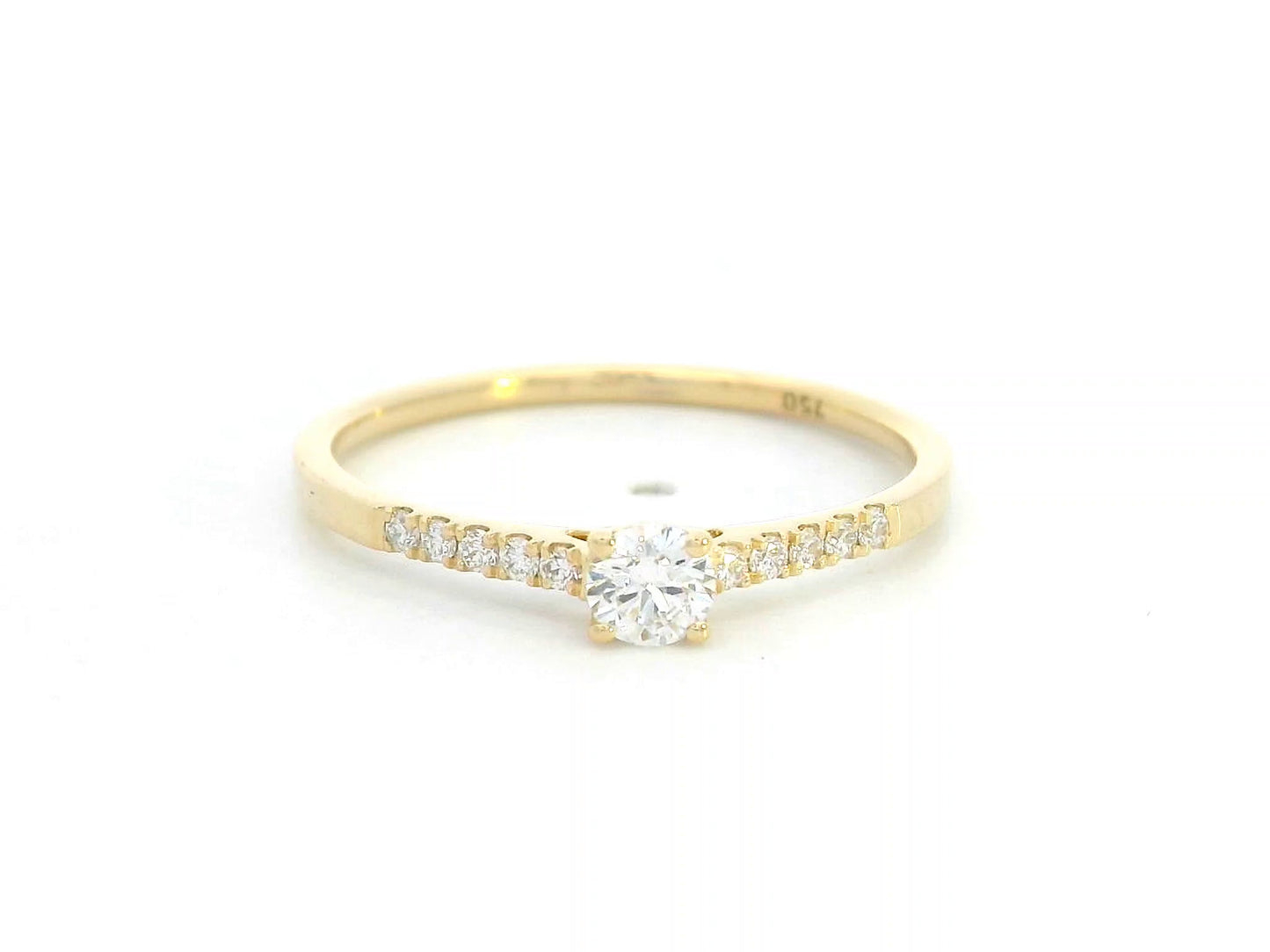18K yellow gold ring with 0.18ct round center diamond and 10 smaller side diamonds set in a classic straight design.