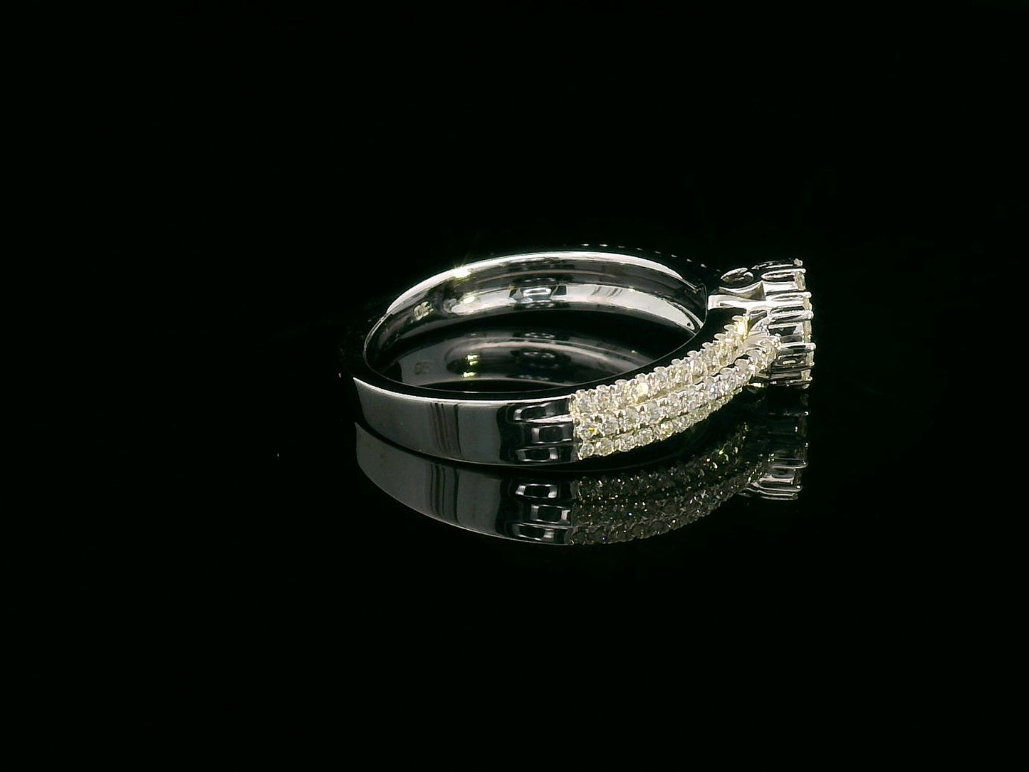 18K gold diamond cluster engagement ring with triple-row diamond band and 0.70ct total diamond weight