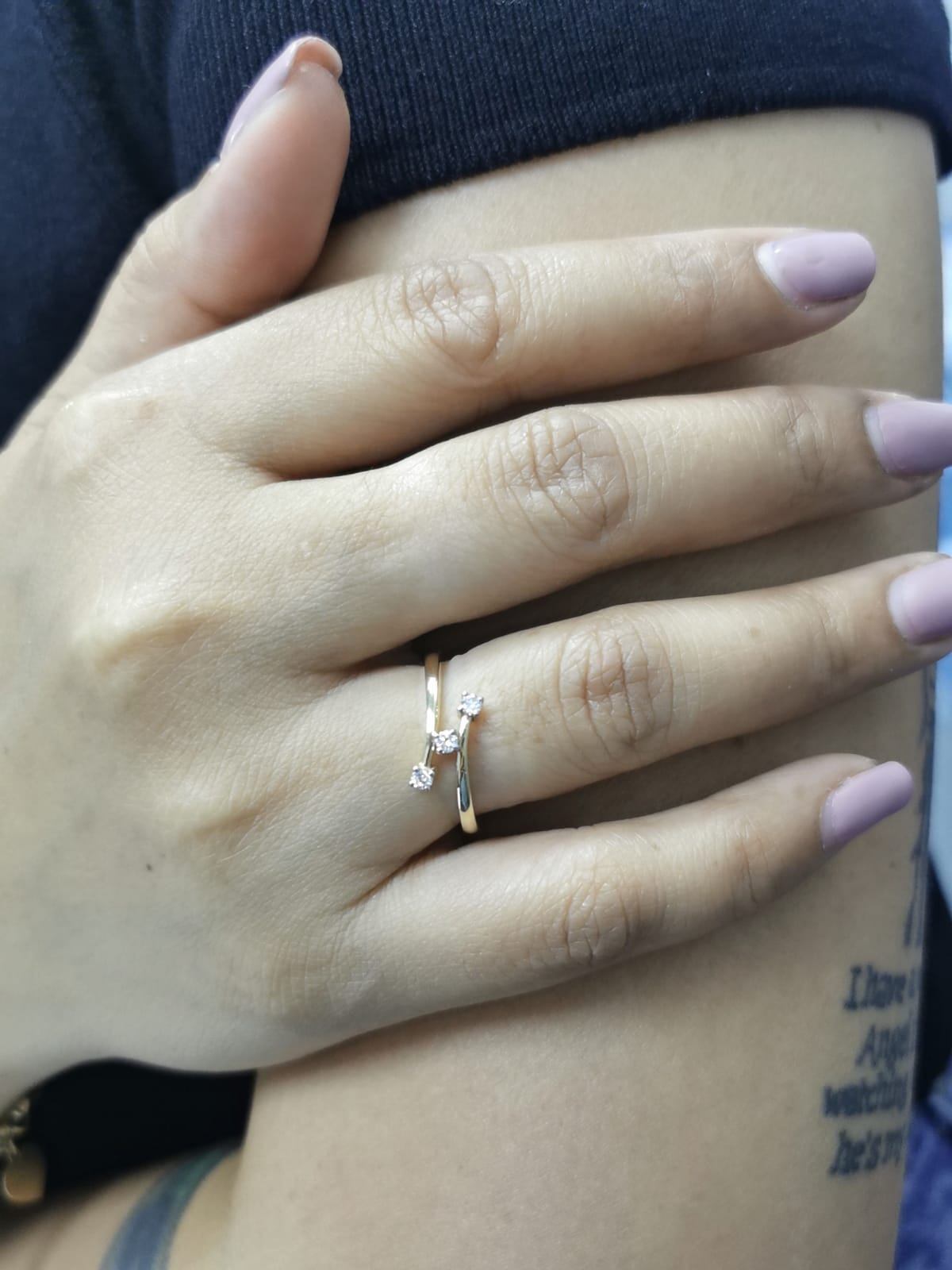 18K gold open bypass ring with three round diamonds totaling 0.13ct, minimalist modern design