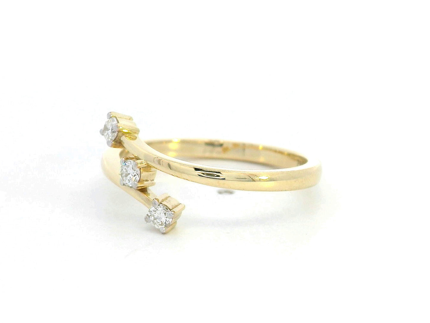 18K gold open bypass ring with three round diamonds totaling 0.13ct, minimalist modern design