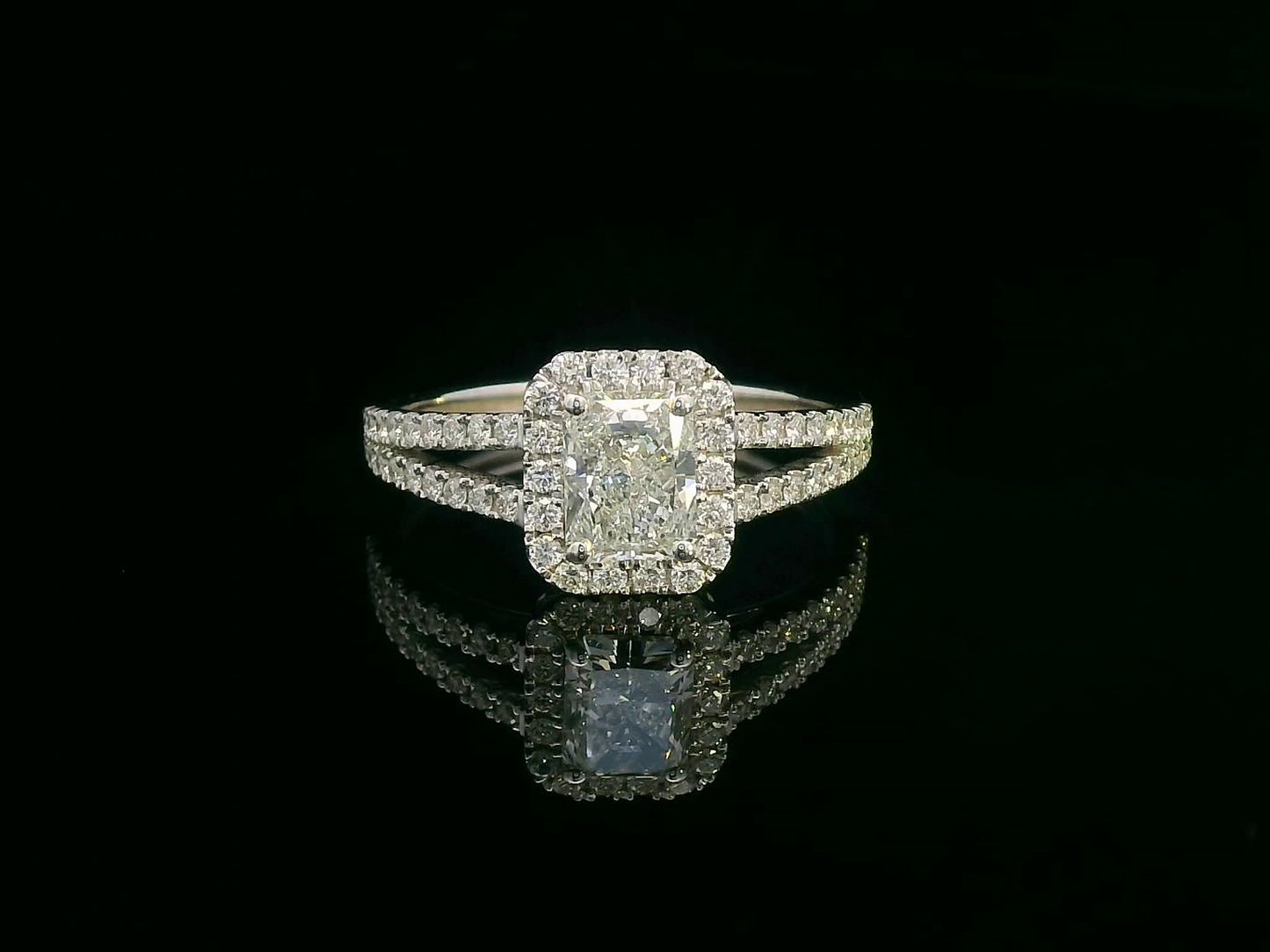 Radiant cut diamond engagement ring in 18K white gold with halo and split shank, 1.32 carat total