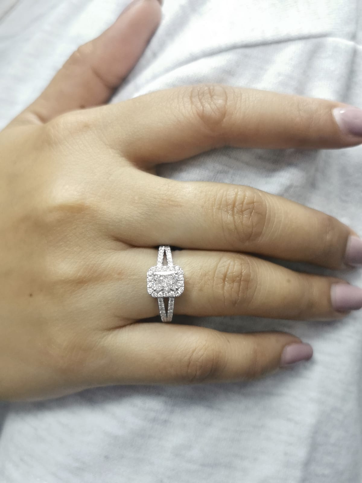 Radiant cut diamond engagement ring in 18K white gold with halo and split shank, 1.32 carat total