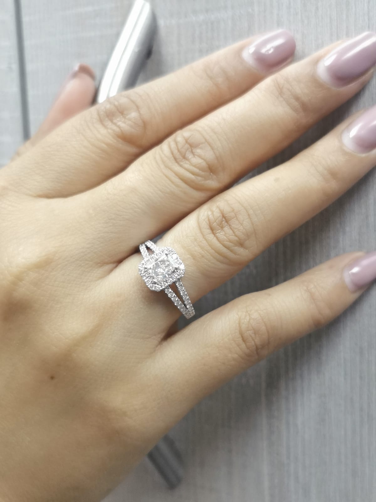 Radiant cut diamond engagement ring in 18K white gold with halo and split shank, 1.32 carat total