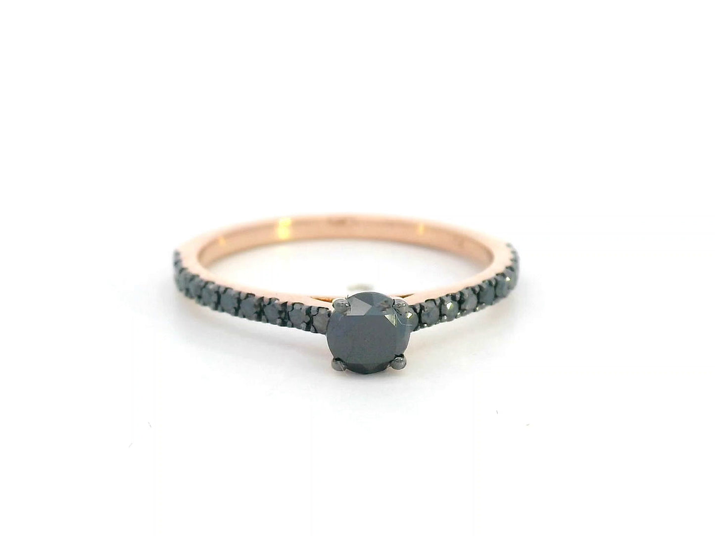 18K gold ring with round black center diamond and half eternity black diamonds along the band, modern minimalist style.