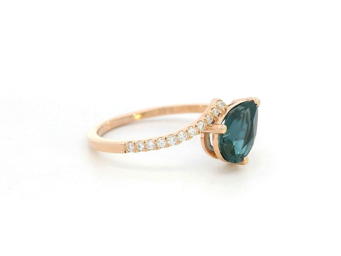 18K rose gold ring with pear-shaped London Blue Topaz and pavé diamond band