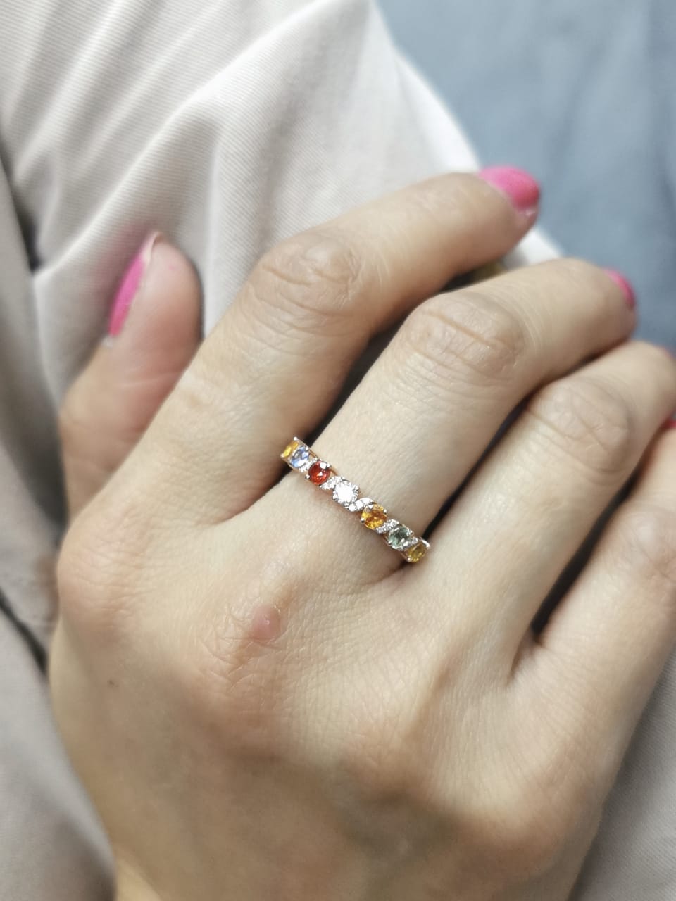 18K rose gold ring with round cut multi-colored sapphires and accent diamonds – rainbow gemstone band