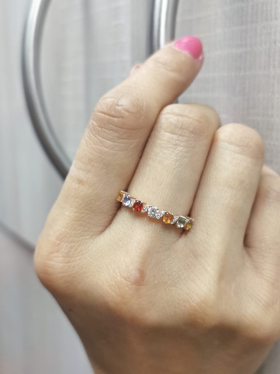 18K rose gold ring with round cut multi-colored sapphires and accent diamonds – rainbow gemstone band