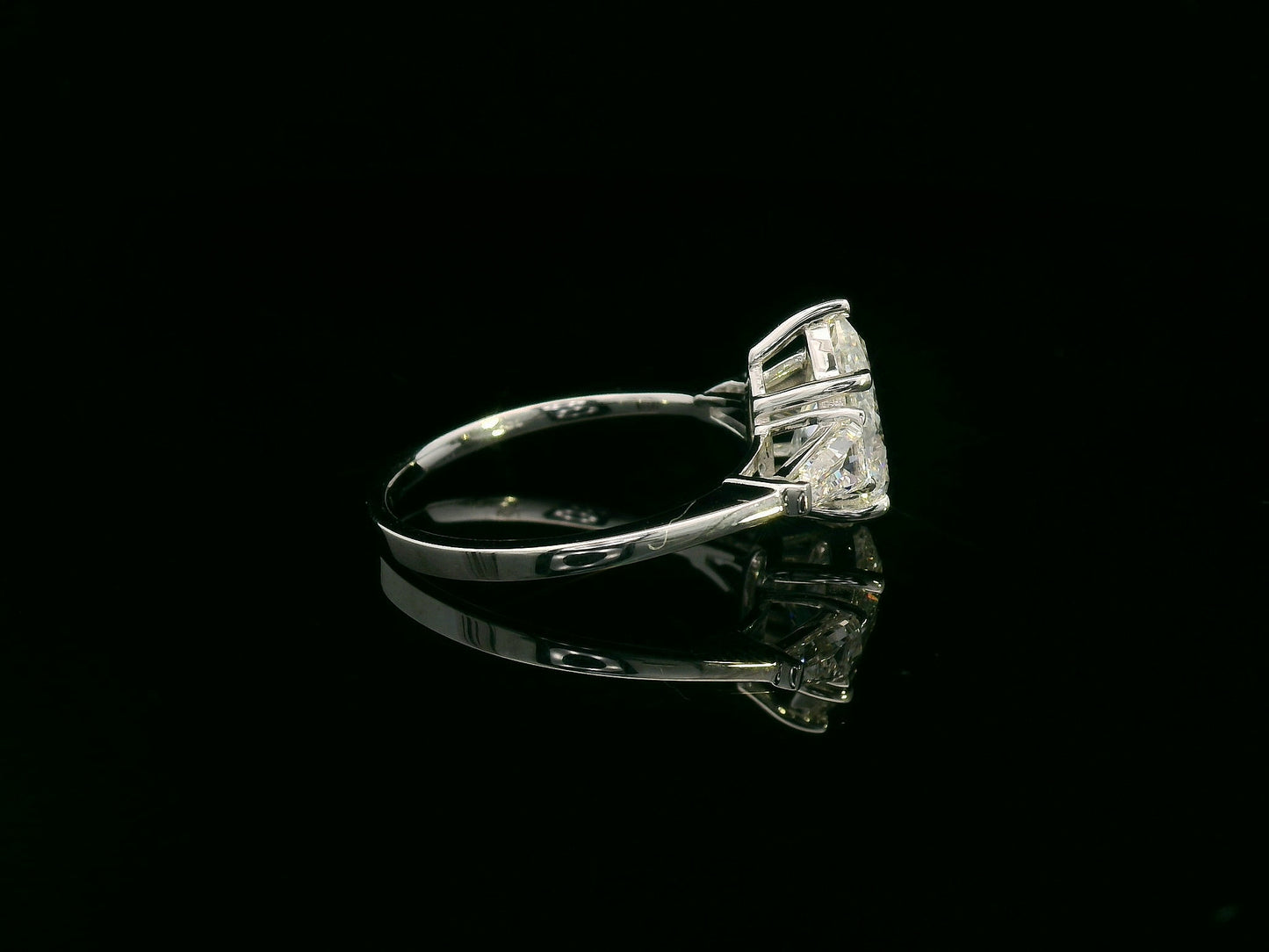 18K white gold ring with 2.01 carat pear-cut GIA-certified diamond and tapered baguette side stones