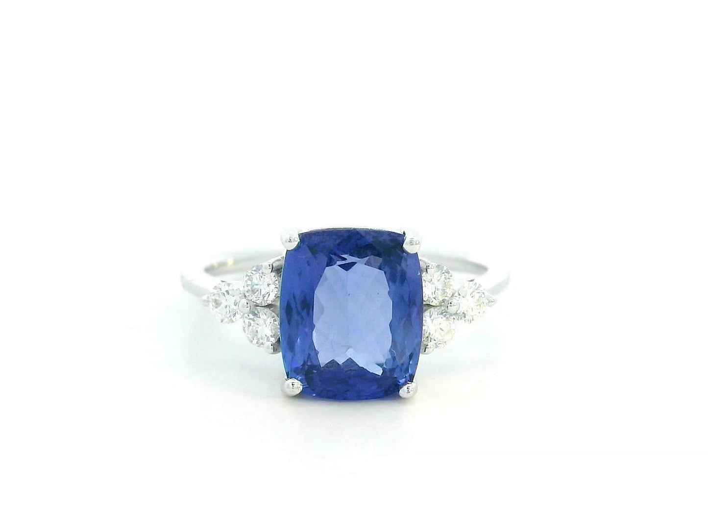 18K White Gold Cushion-Cut Tanzanite Ring with three Diamonds on the shoulder – 3.50ct center stone and 0.33ct round diamonds