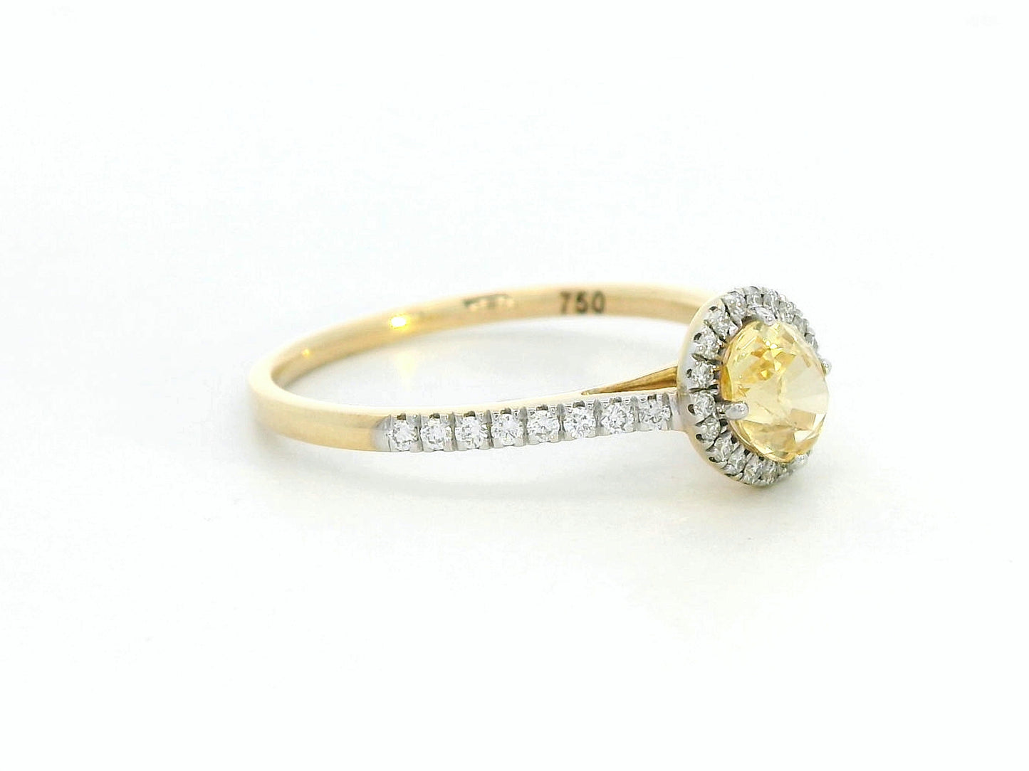 18K Gold Yellow Oval-shape Sapphire Ring with Diamond Halo.