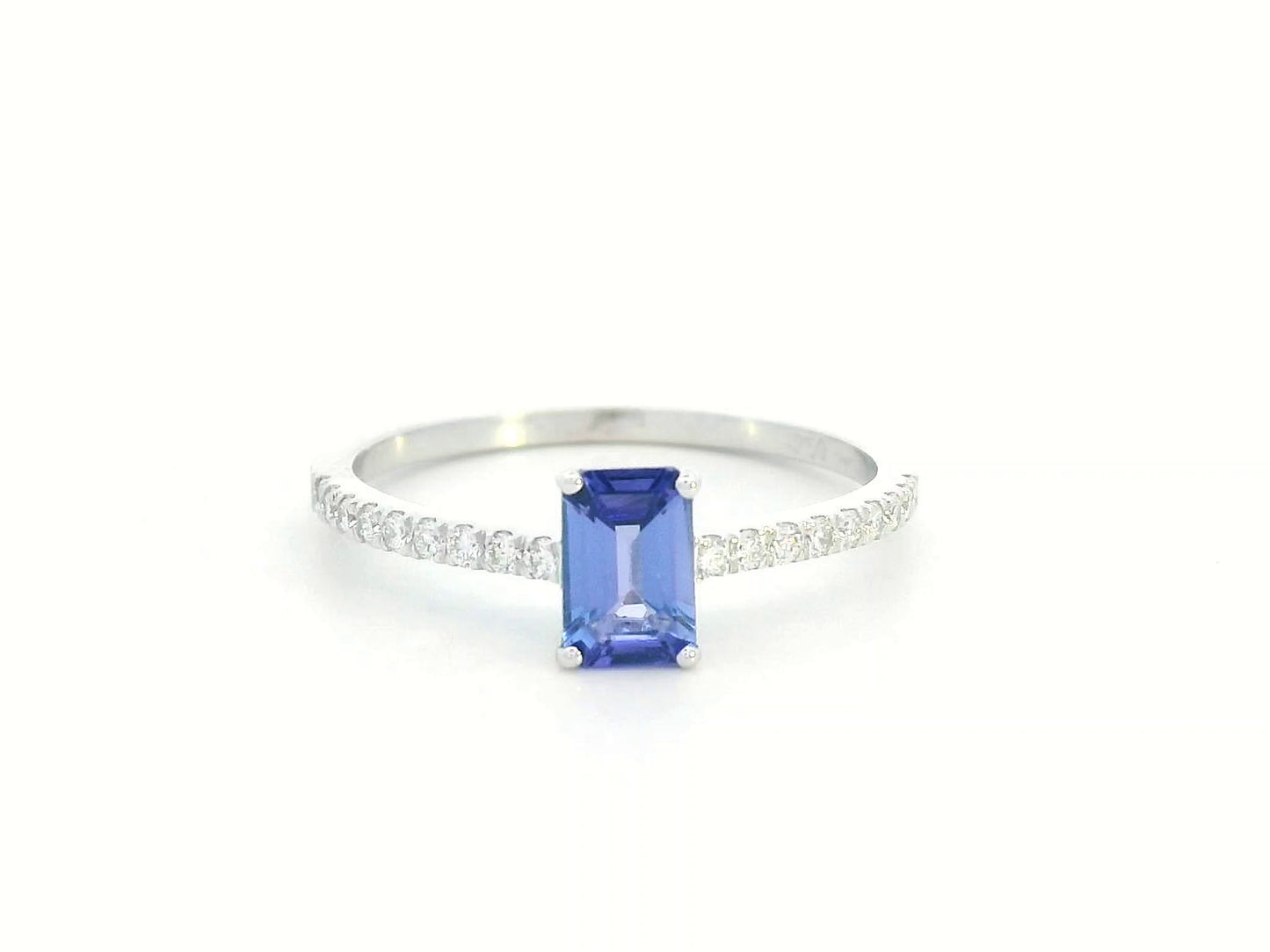 Emerald-cut Tanzanite ring in 18K white gold with diamond-accented band – 0.56ct center stone