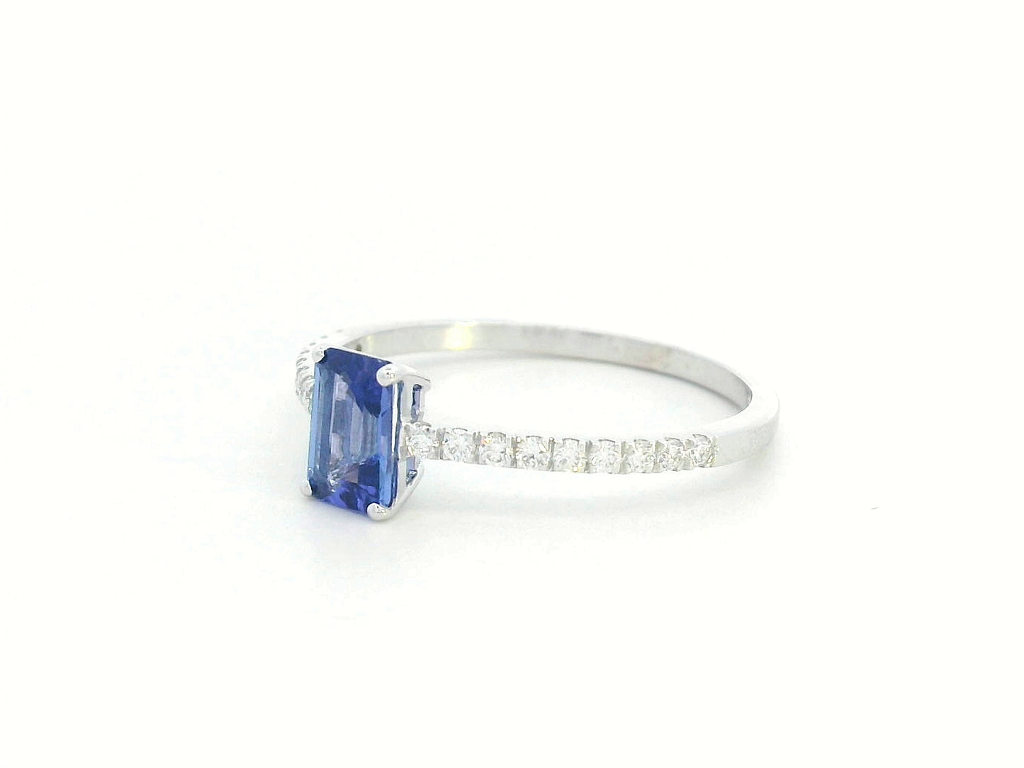 Emerald-cut Tanzanite ring in 18K white gold with diamond-accented band – 0.56ct center stone