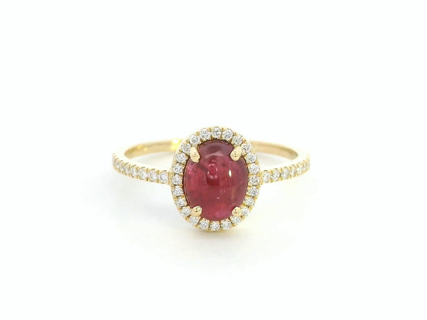 18K yellow gold ring with 1.94ct oval cabochon ruby and 0.25ct diamond halo