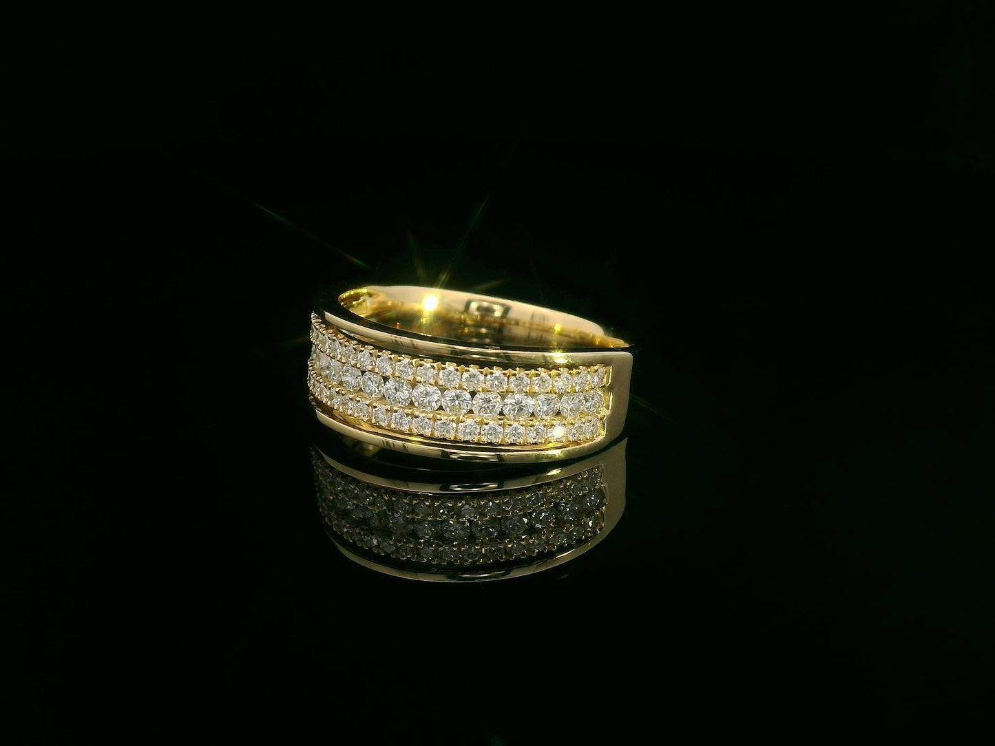 18K gold wide band ring with three rows of diamonds and two polished gold borders – 0.72ct