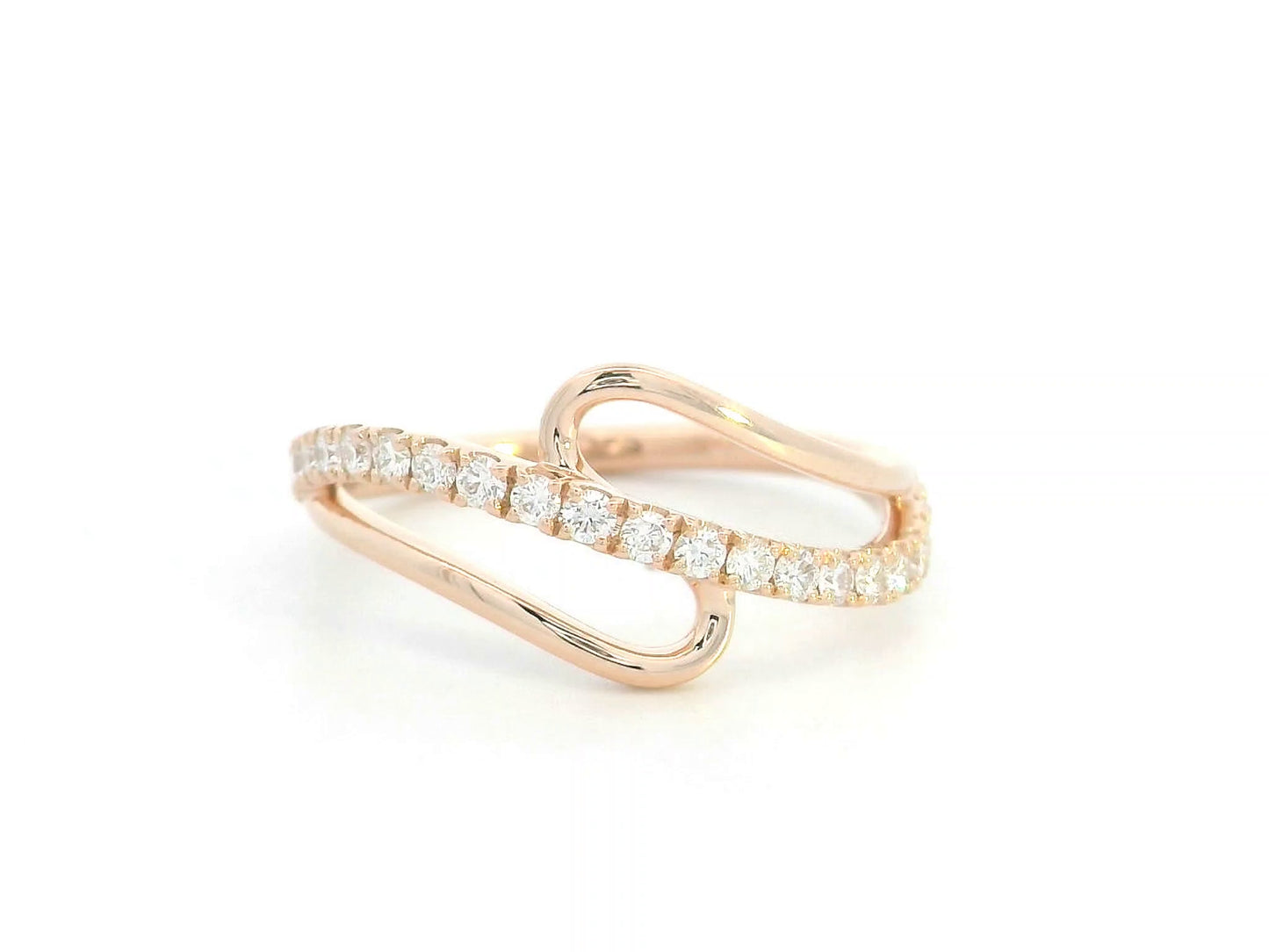 18K rose gold bypass ring with 0.37ct diamonds and open asymmetric design