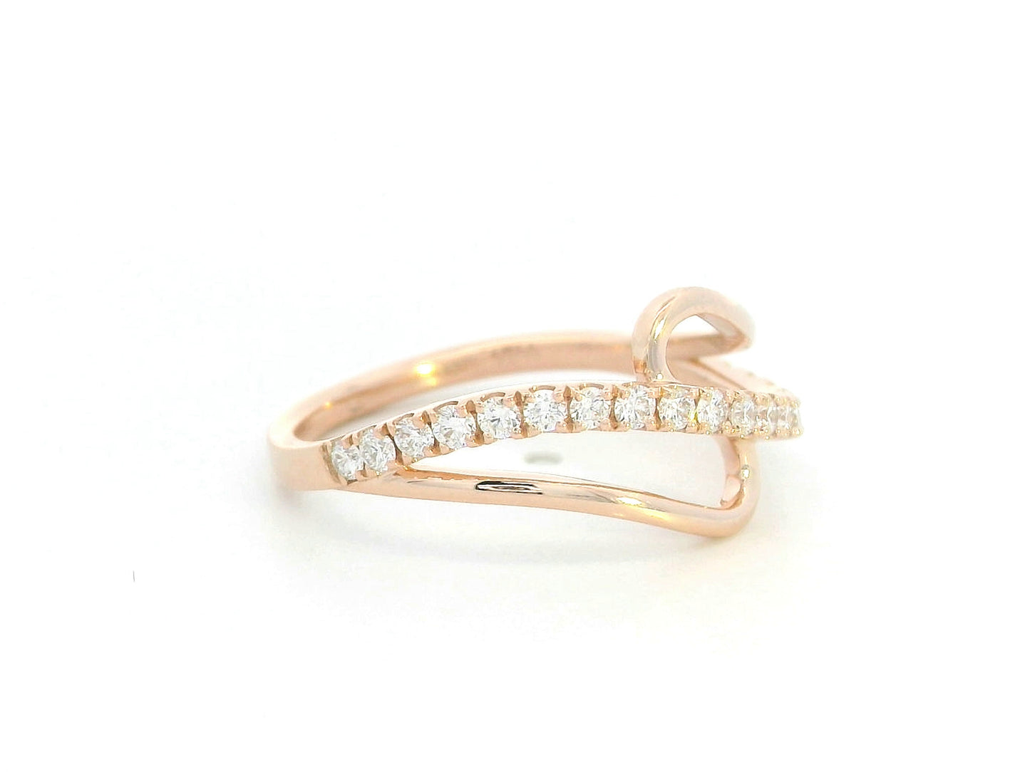 18K rose gold bypass ring with 0.37ct diamonds and open asymmetric design