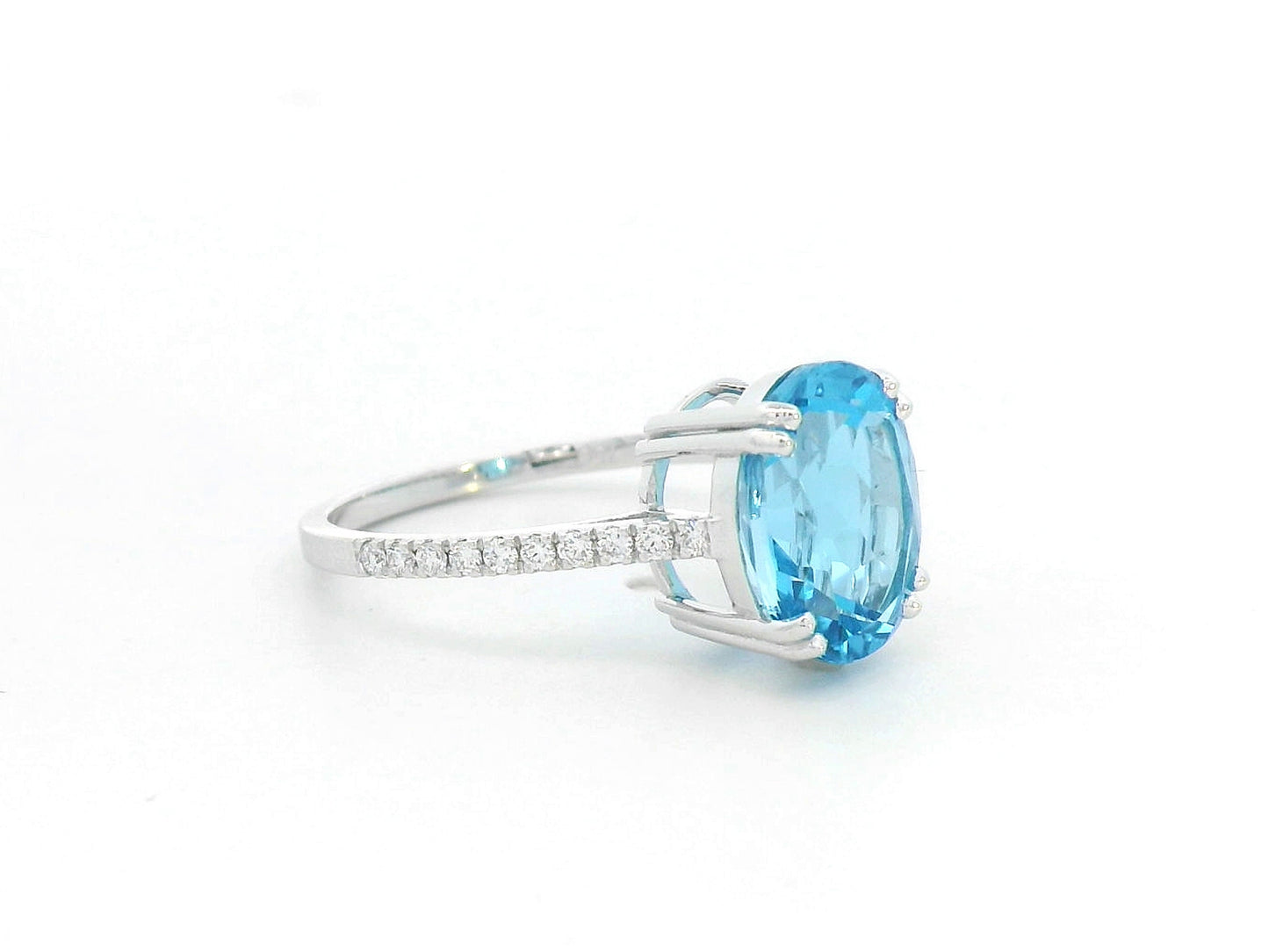 18K white gold ring with 4.58 carat oval Swiss Blue Topaz and diamond-accented band