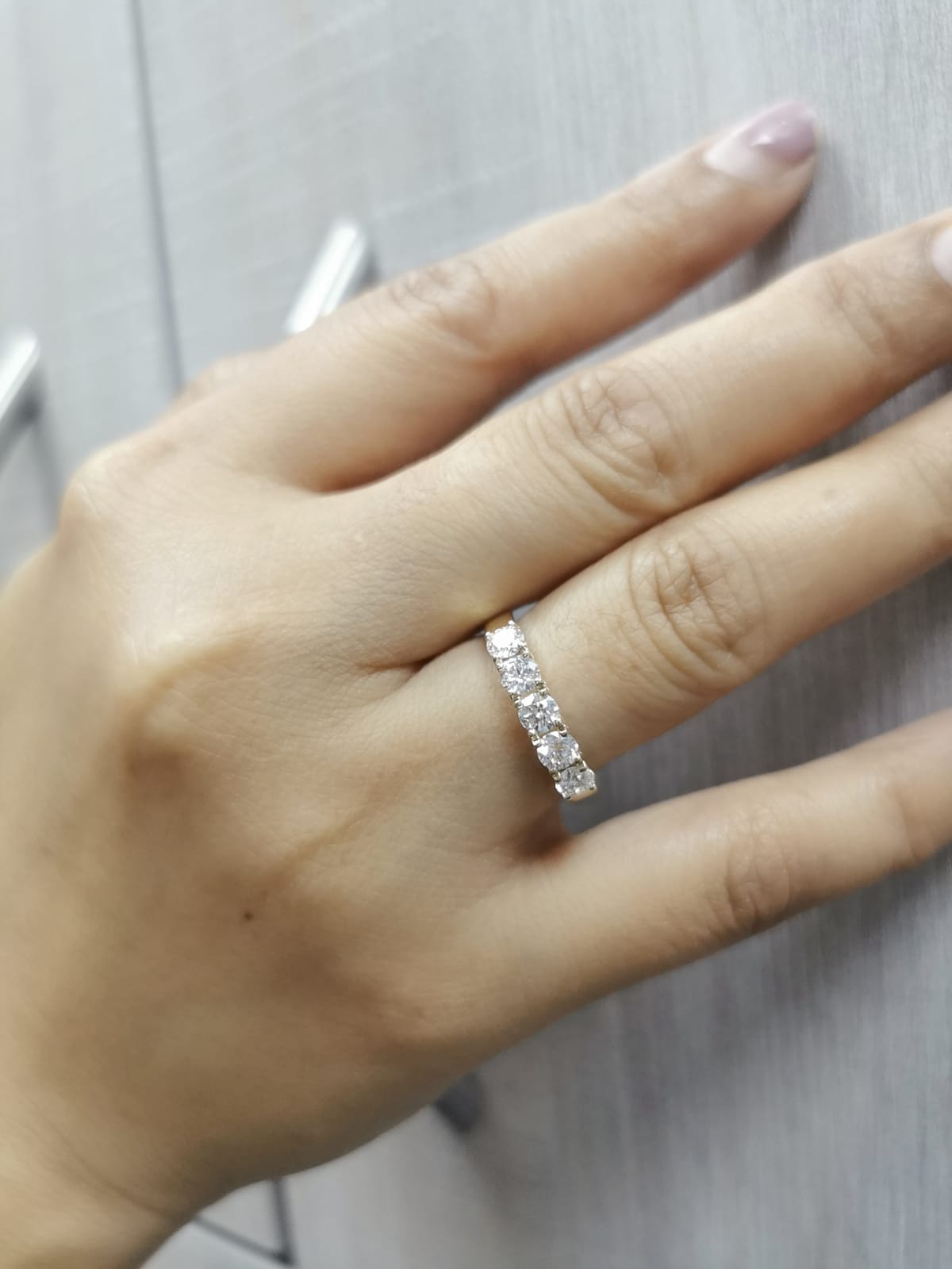18K yellow gold five-stone diamond ring with round brilliant cut diamonds, elegant and symbolic design