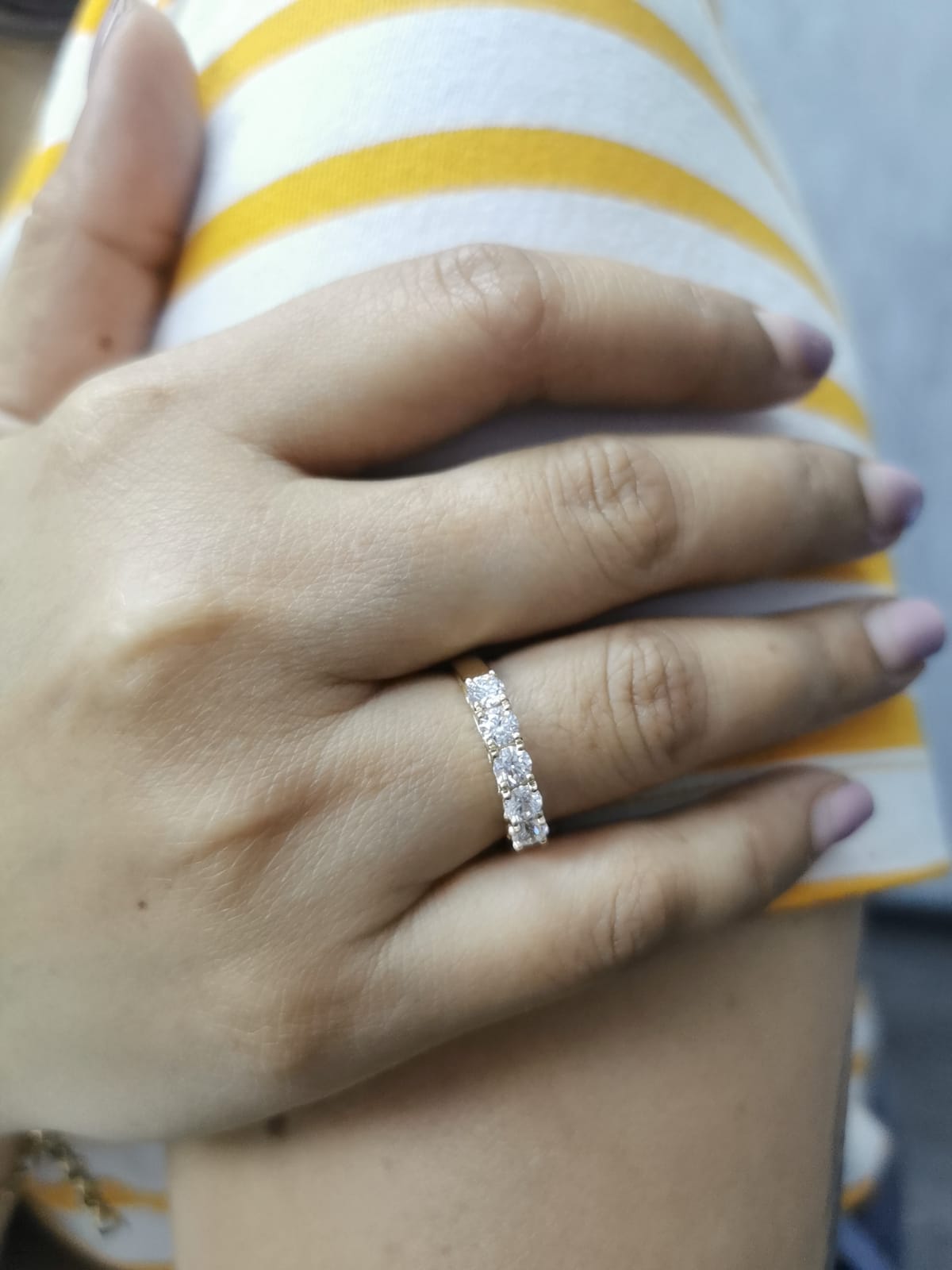 18K yellow gold five-stone diamond ring with round brilliant cut diamonds, elegant and symbolic design