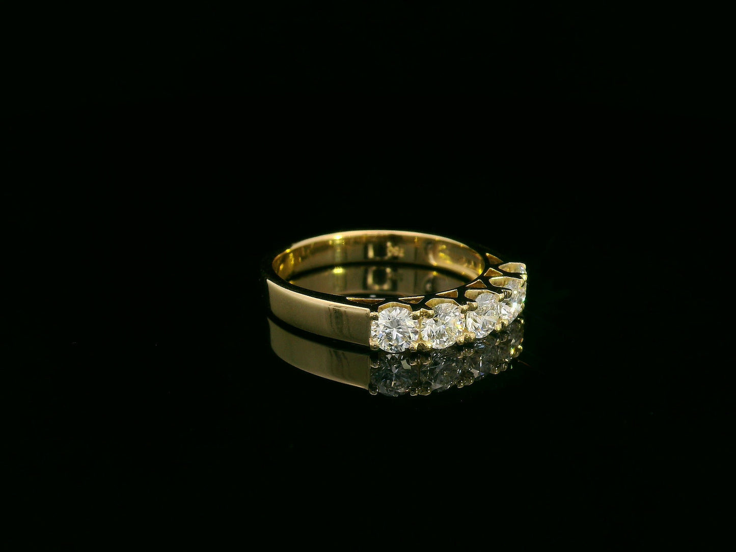 18K yellow gold five-stone diamond ring with round brilliant cut diamonds, elegant and symbolic design
