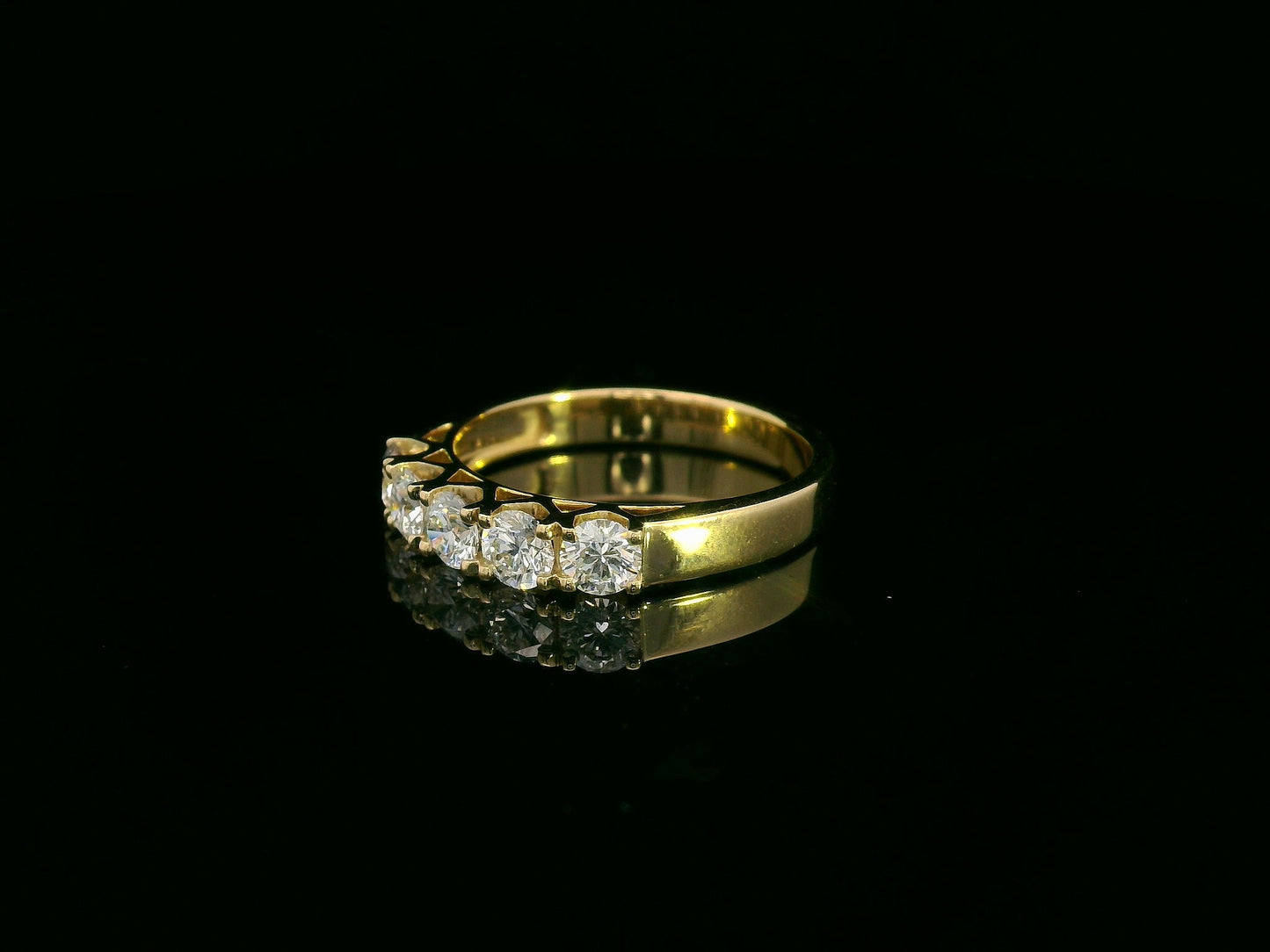 18K yellow gold five-stone diamond ring with round brilliant cut diamonds, elegant and symbolic design