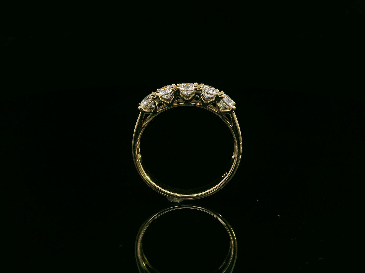 18K yellow gold five-stone diamond ring with round brilliant cut diamonds, elegant and symbolic design