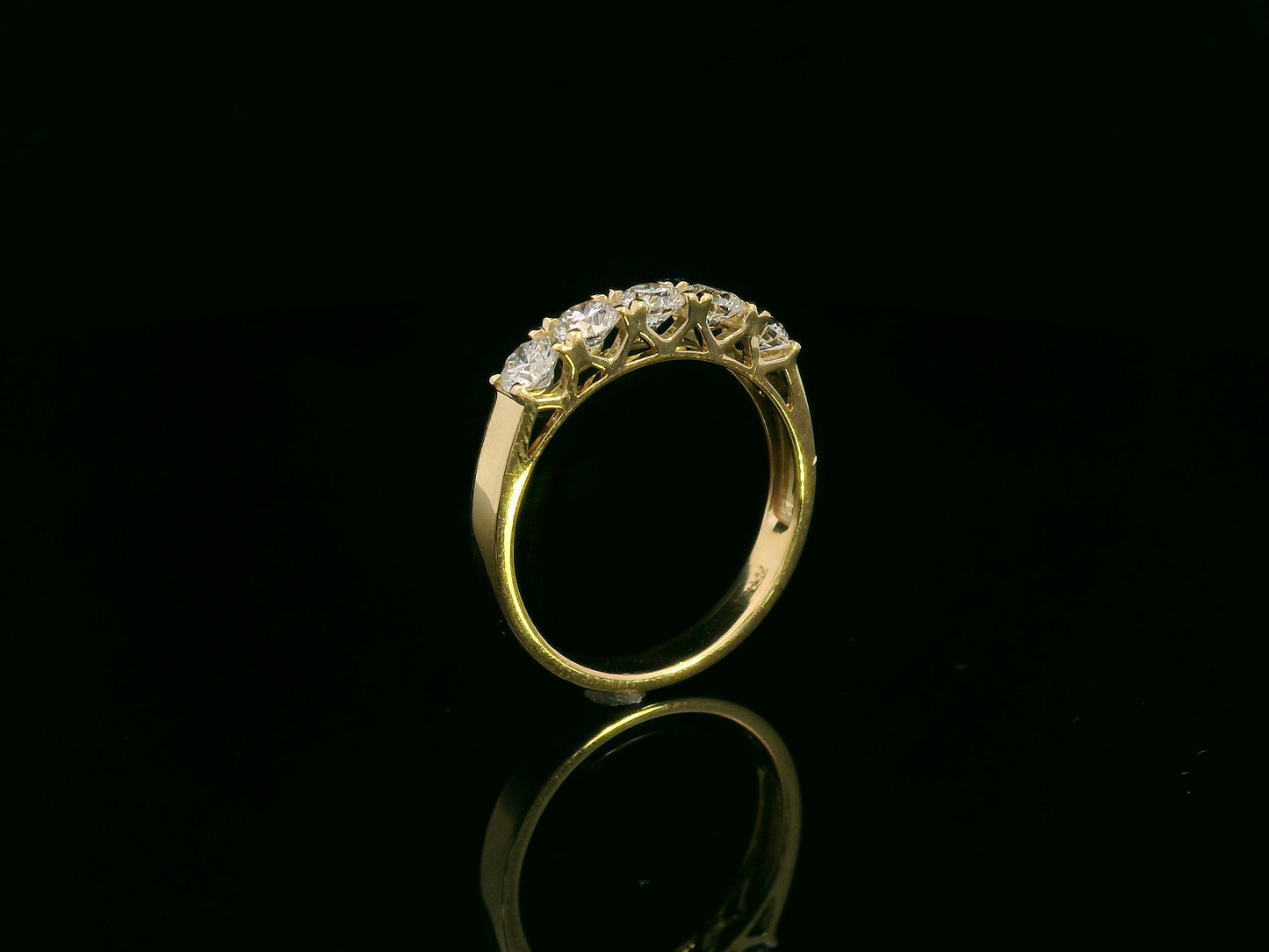 18K yellow gold five-stone diamond ring with round brilliant cut diamonds, elegant and symbolic design