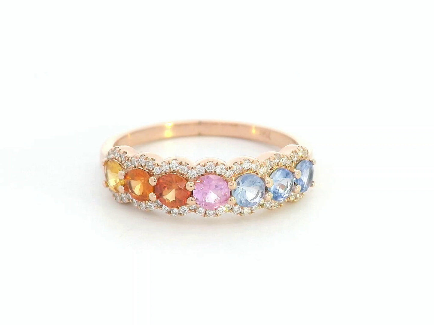 Rainbow sapphire ring in 18K rose gold with diamond halo