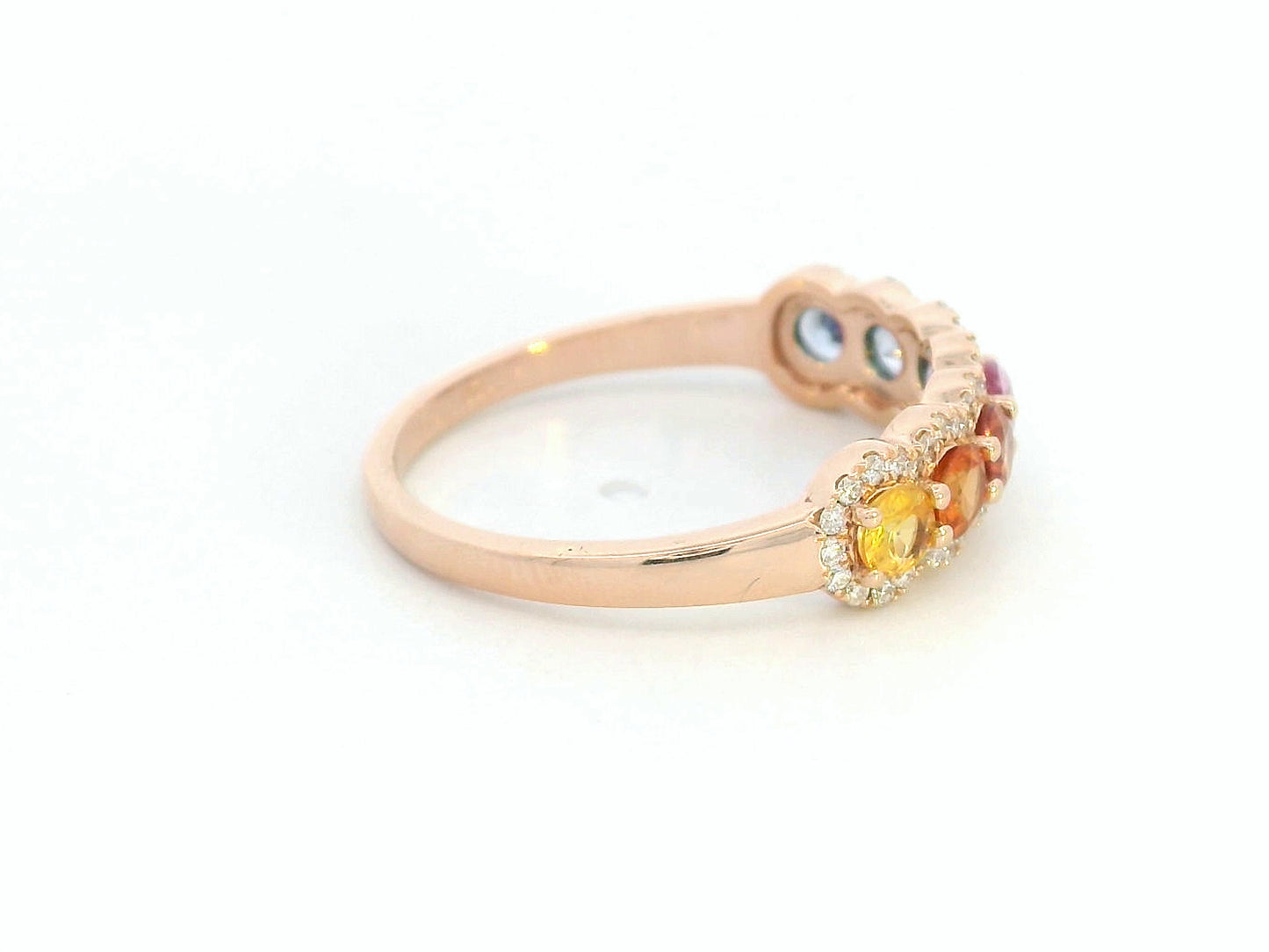 18K rose gold ring featuring colorful sapphires and diamonds