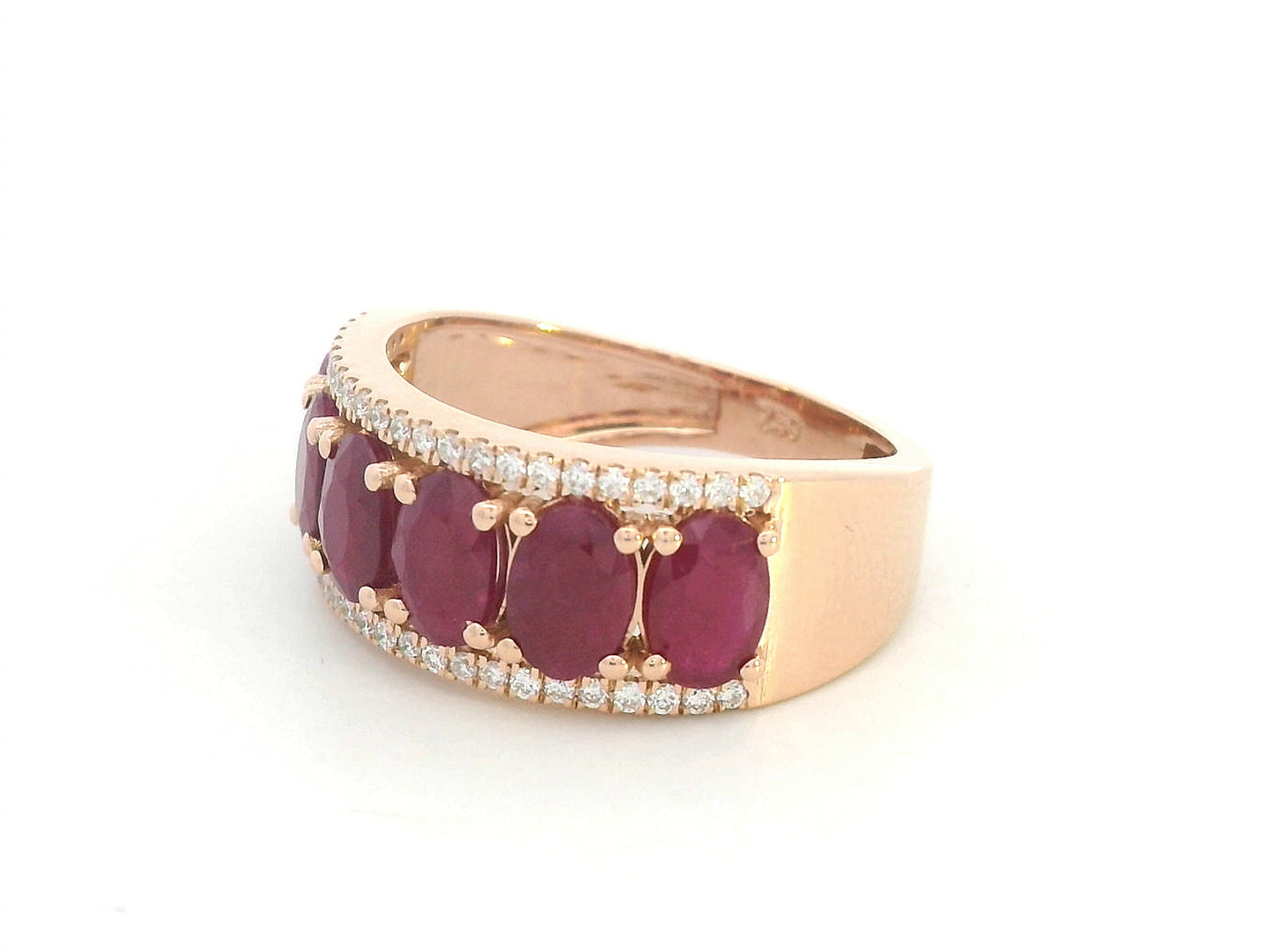 Luxury ruby center band ring with side diamonds in gold